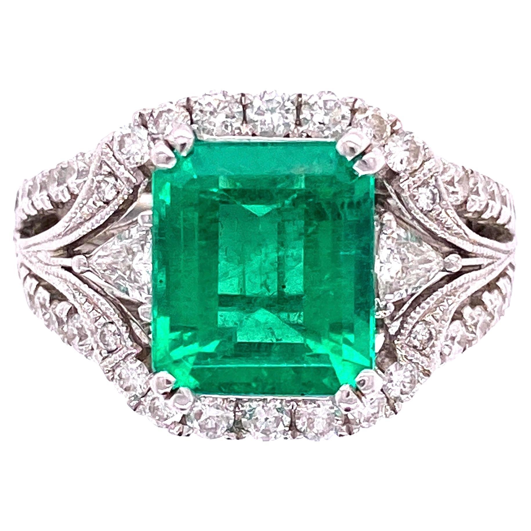 Mid-Century Modern Emerald Cut Emerald and Diamond Gold Cocktail Ring For Sale