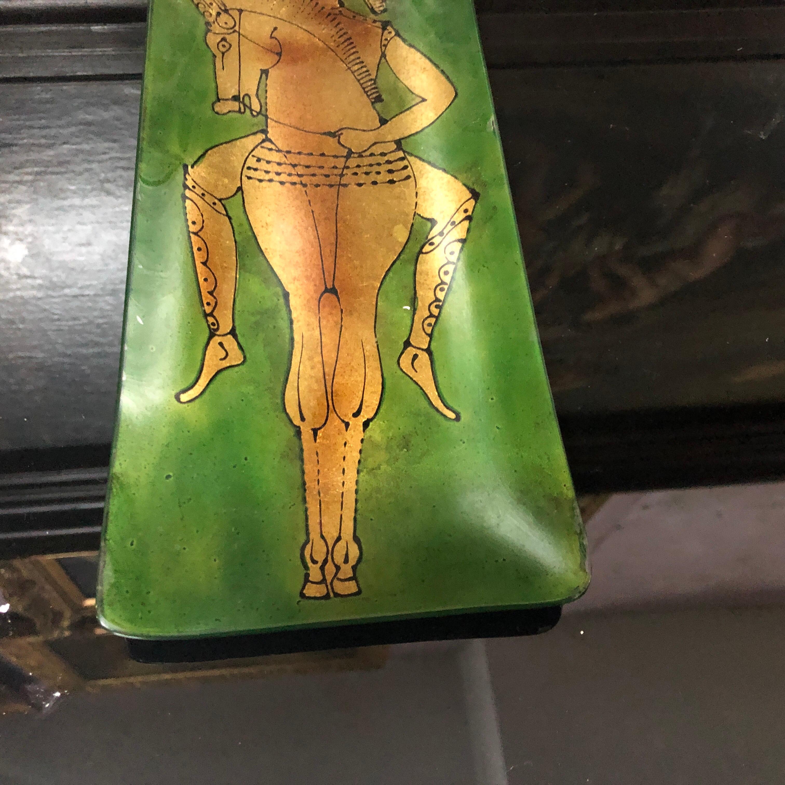 A stylish green enameled copper tray decorated with a gold horse, made in Italy in the 1950s.