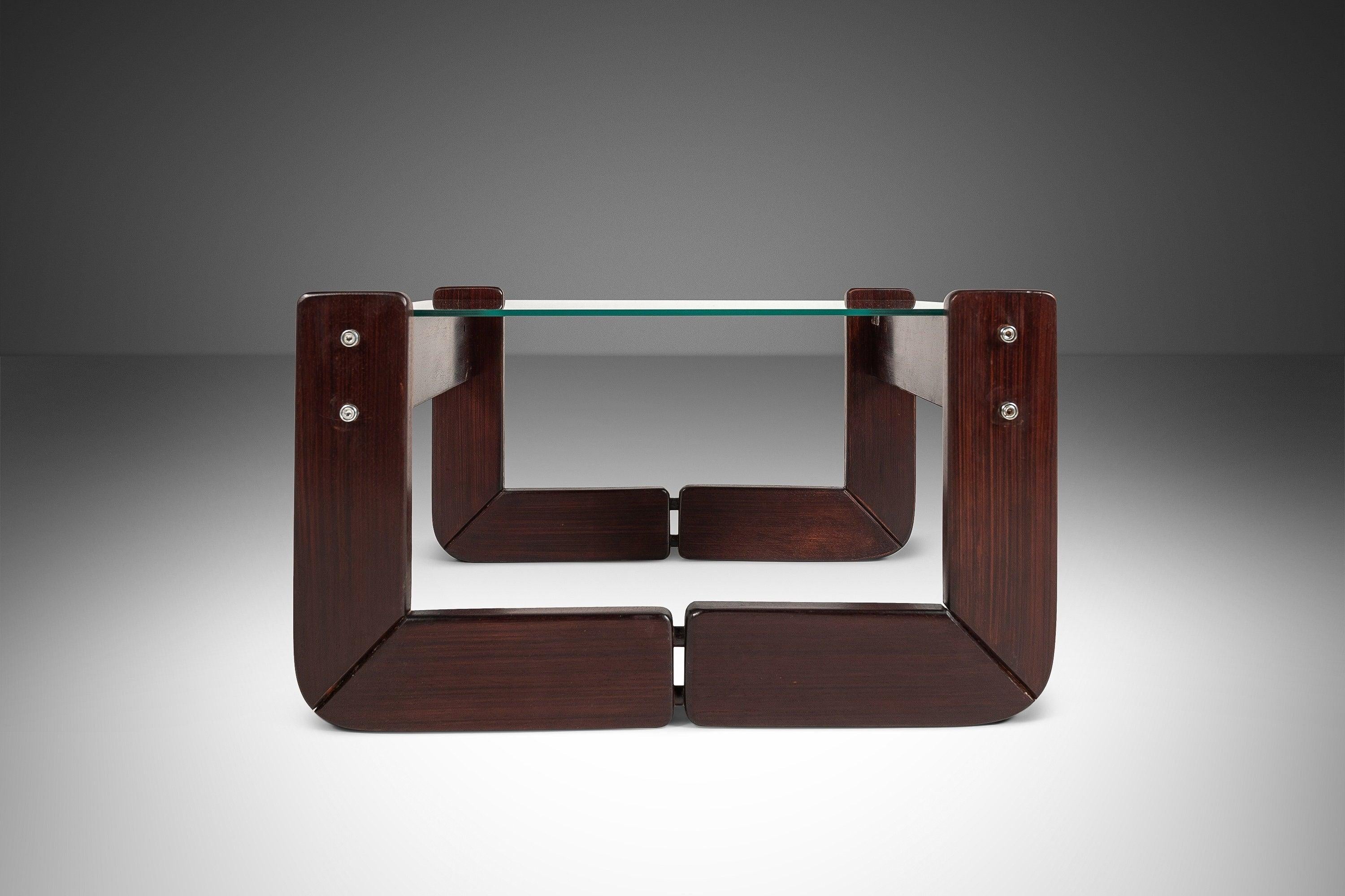 Attention collectors! This alluring end table, designed by the incomparable Percival Lafer, is the epitome of Brazilian minimalism for which Lafer and his furniture company are regarded as the paramount makers. The solid jacaranda frame is in superb