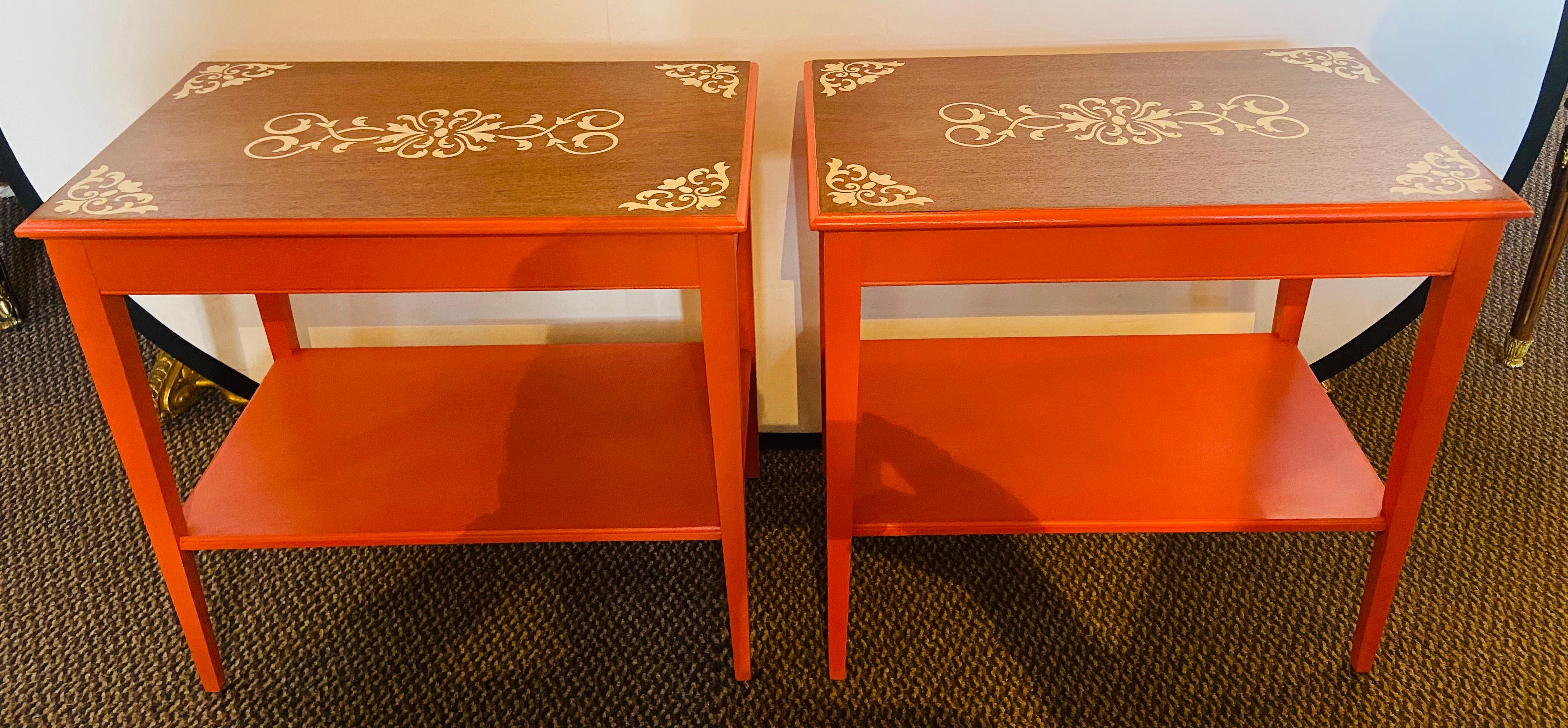 A pair of Mid-Century Modern end tables, night, lamp, or side tables. A painted pair of small end tables. These circa 1950s end or side tables are solid mahogany having been later paint decorated to enhance them to the glamour that was so commonly