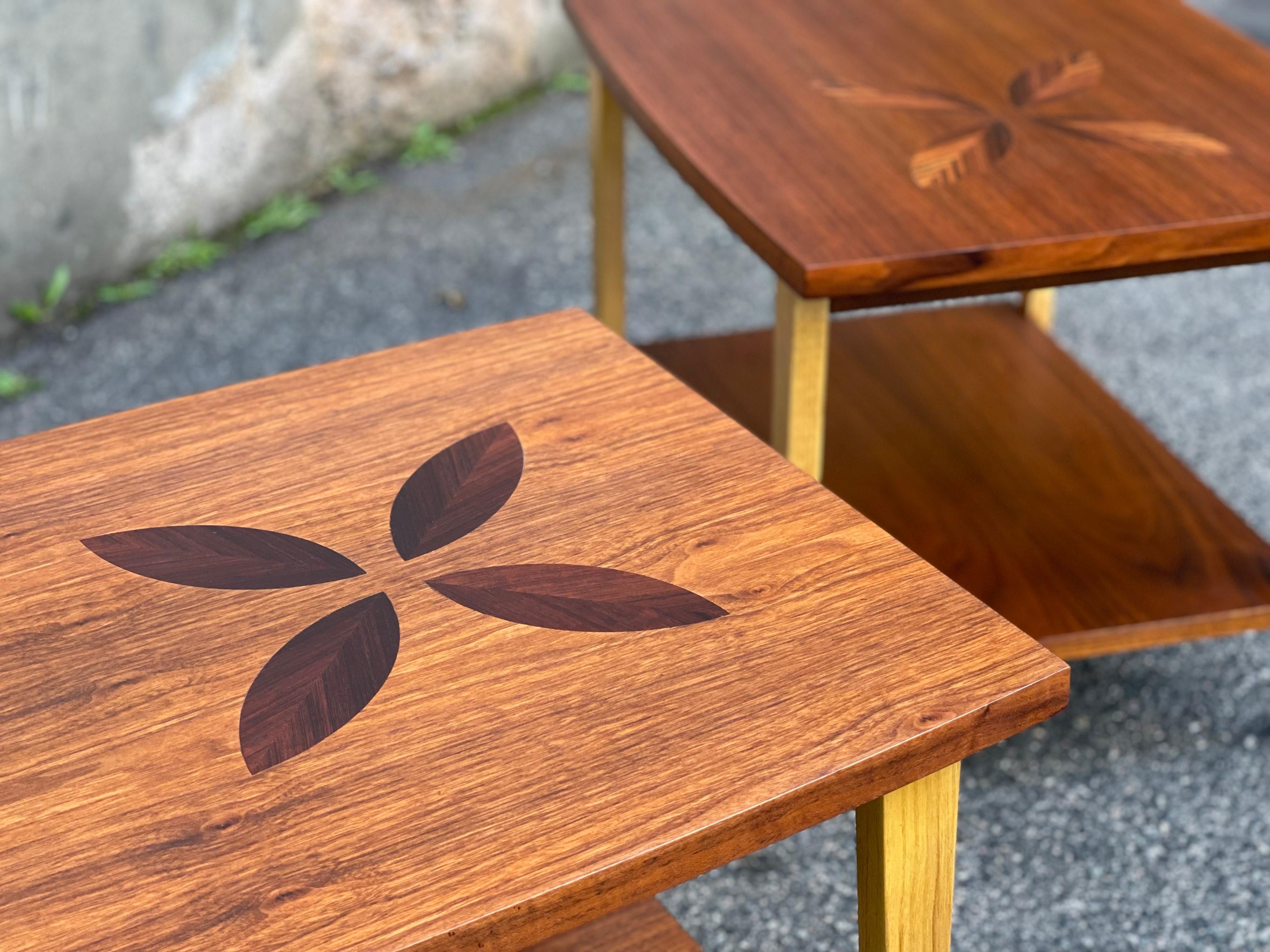 Excellent craftsmanship and construction on these hard-to-find Lane side or lamp tables from the 1960's, with gorgeous rosewood inlay over walnut. The legs are ash with rosewood dowels. Lovely contrasting materials with a flared edge at the back to