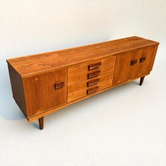 Mid Century Modern English Credenza in African Teak and Rosewood