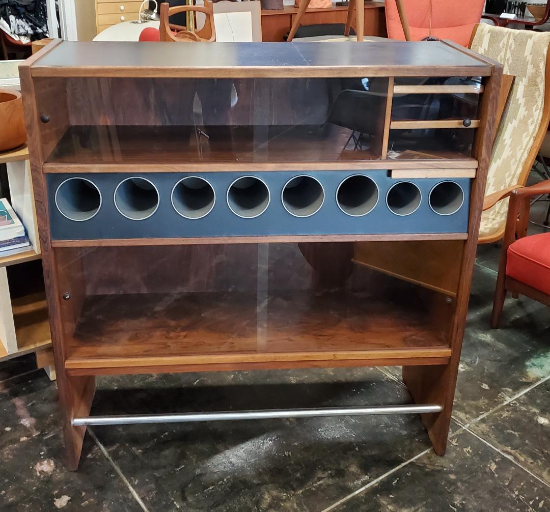 Mid Century Danish Modern Original Dry bar by Erik Buch 1965.
Excellent Mid-Century Modern Original Danish Rosewood Dry Bar Designed by Erik Buch.

This Danish Modern Dry Bar Is Of Rosewood Grain Structure Is In Excellent Vintage Condition. It