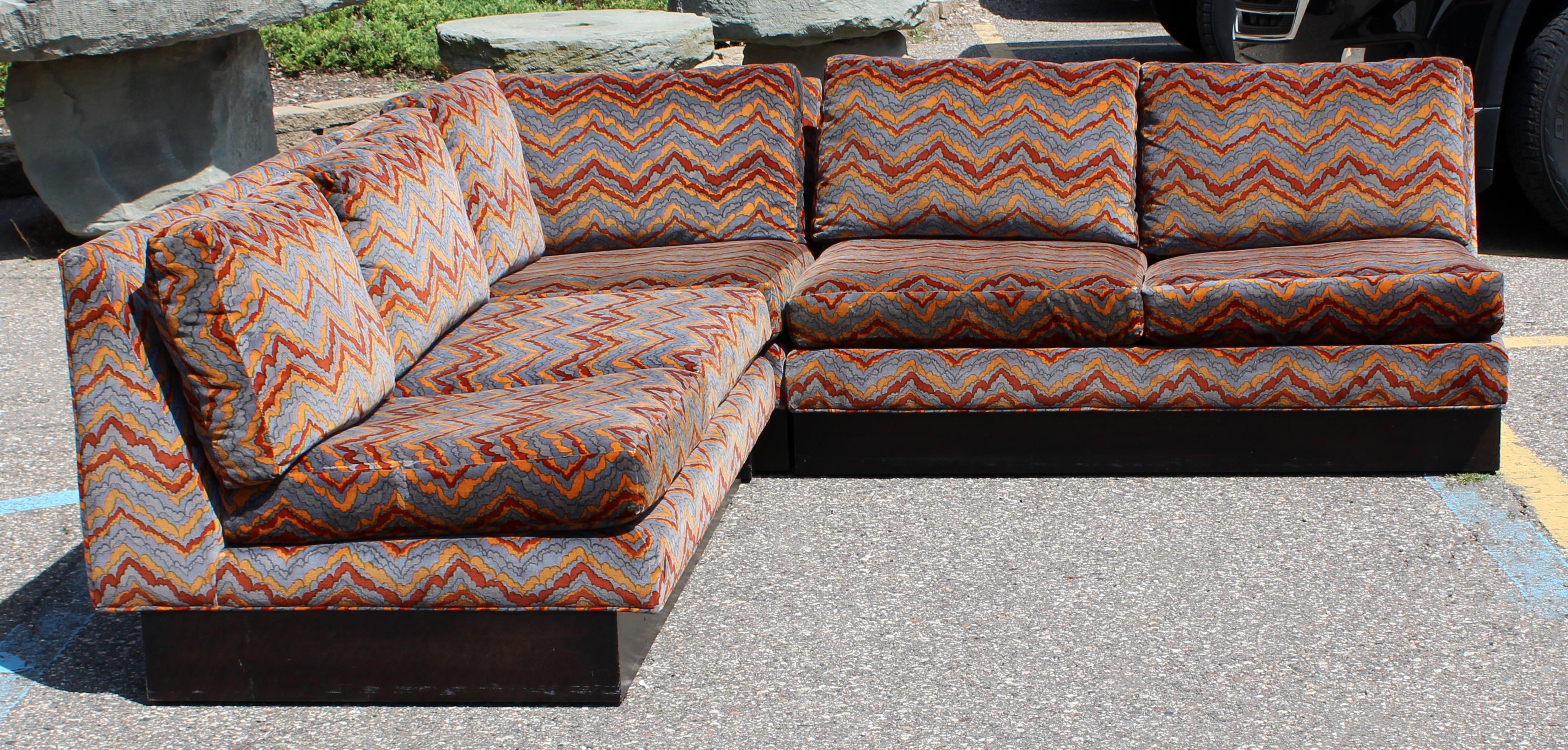 For your consideration is a gorgeous, three-piece sectional plinth base sofa by Erwin Lambeth, circa 1970s. Done in Jack Lenor Larsen fabric. In excellent condition. The dimensions of each piece are 52/33