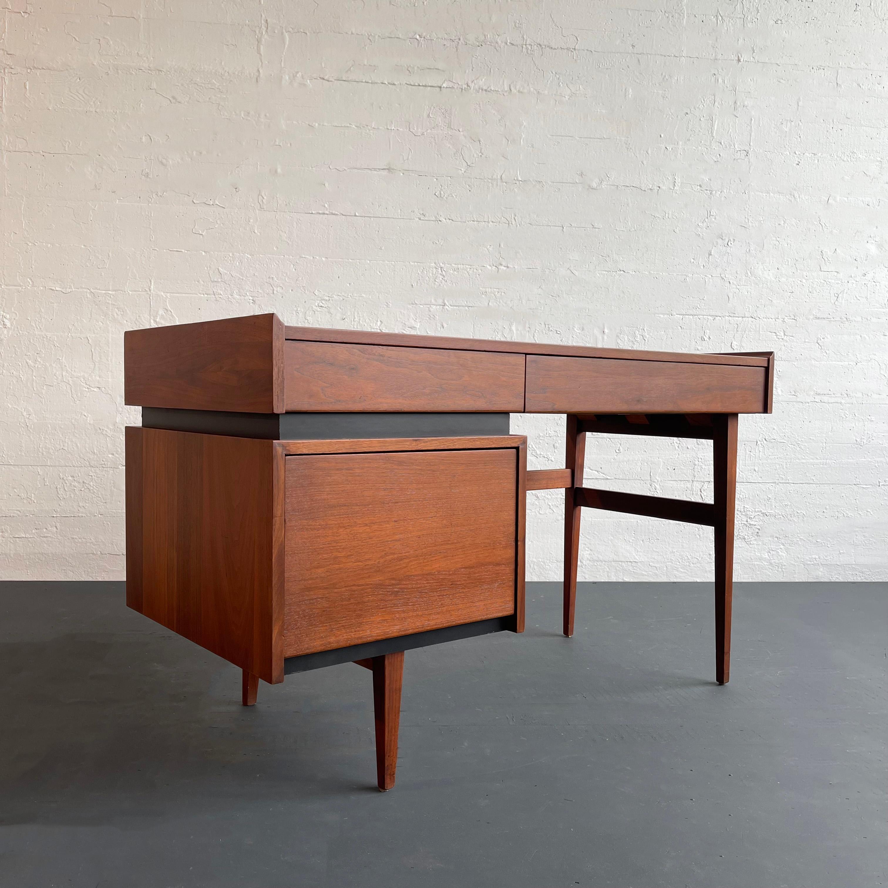 Mid-century modern, walnut desk designed by Merton L. Gershun for Dillingham Mfg. Co. for the 