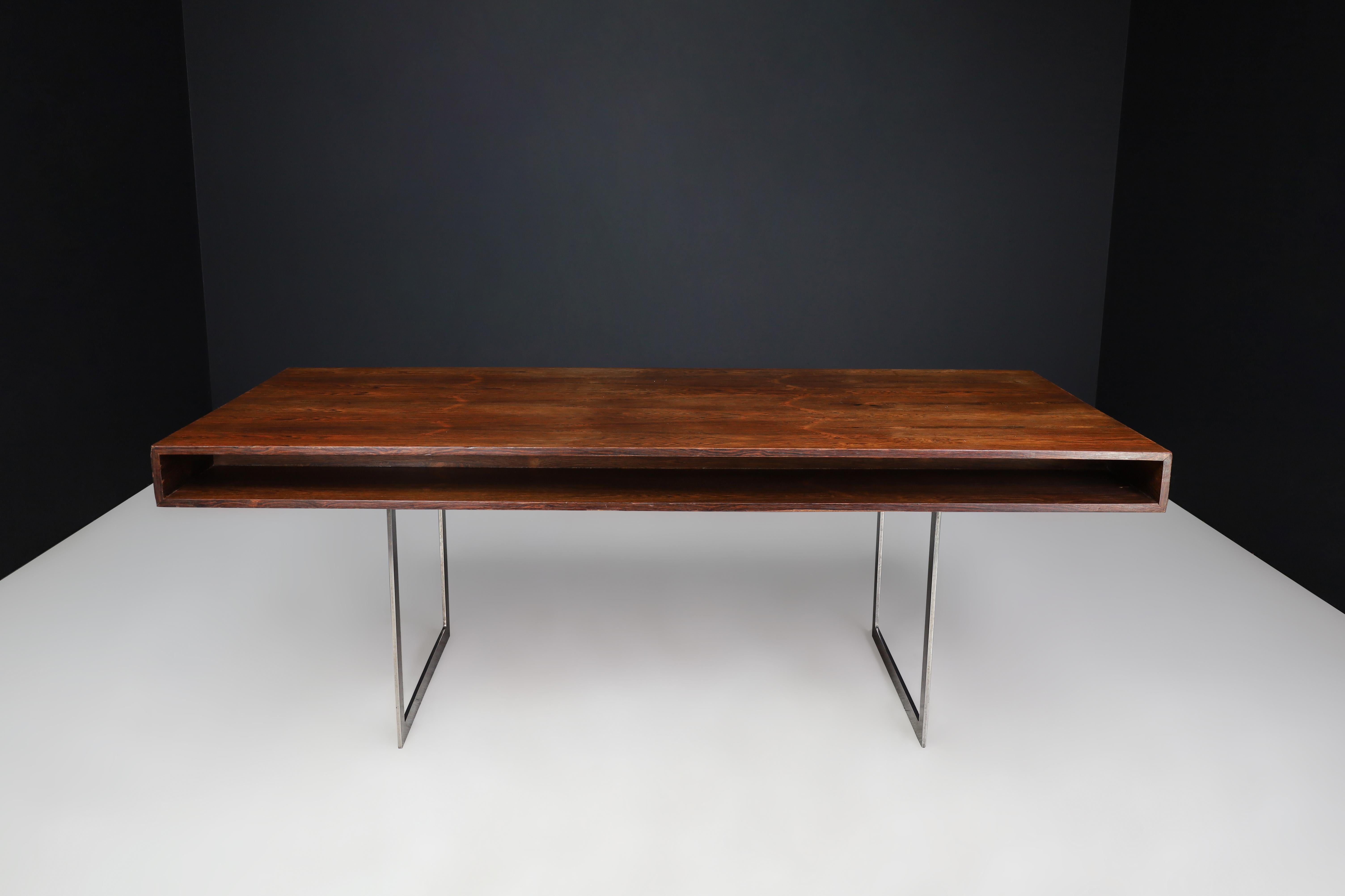 Mid-Century Modern Executive Free Standing Desk in the Style of Bodil Kjær, Denmark, 1960s

Striking and architectural, this exceptional mid-century executive desk was crafted in Denmark in the 1960s and designed in the distinctive style of renowned