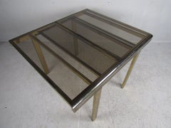 Mid-Century Modern Expanding Brass Dining Table with a Smoked Glass Top