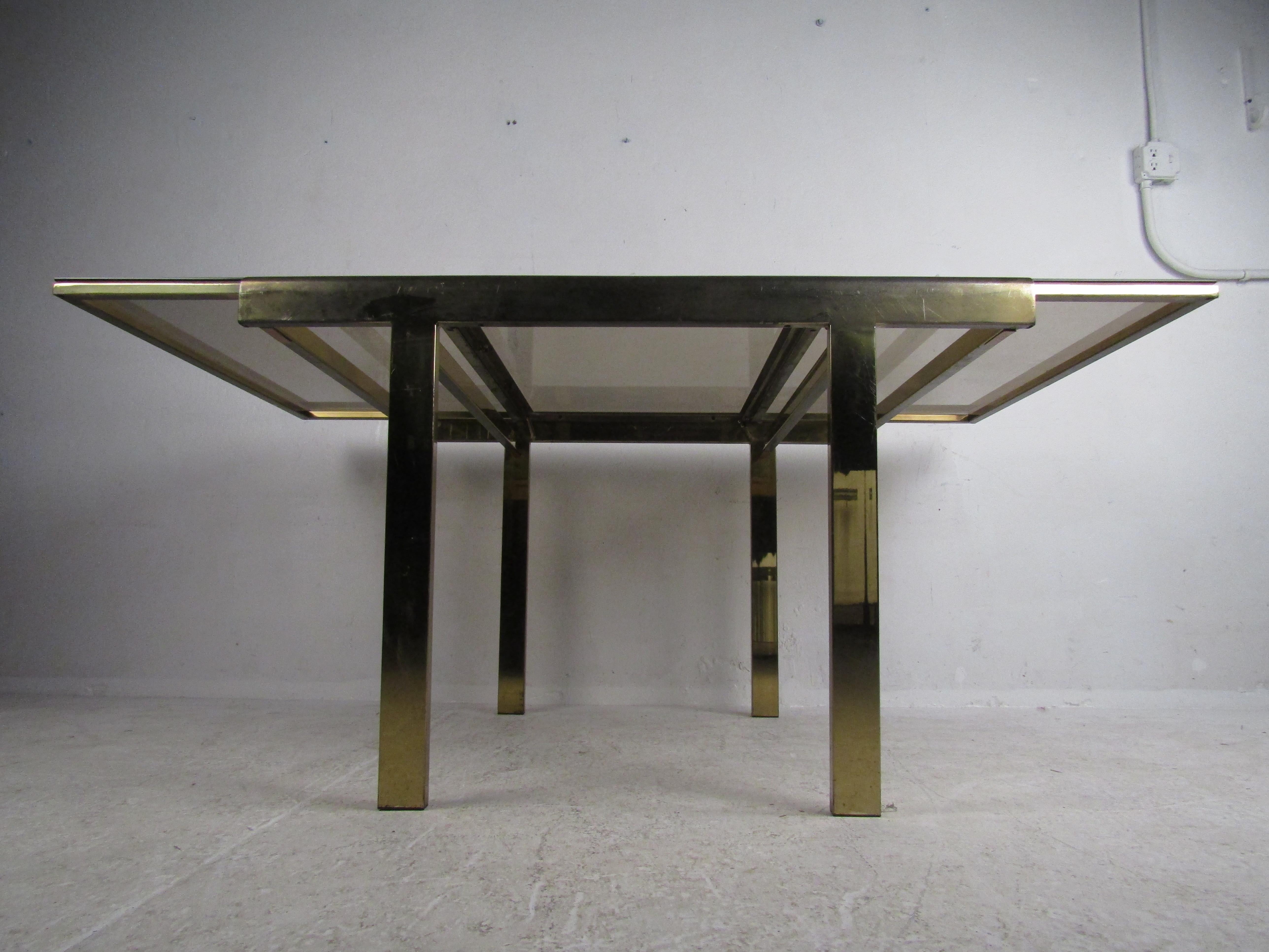 Mid-Century Modern Expanding Brass Dining Table with a Smoked Glass Top In Good Condition For Sale In Brooklyn, NY