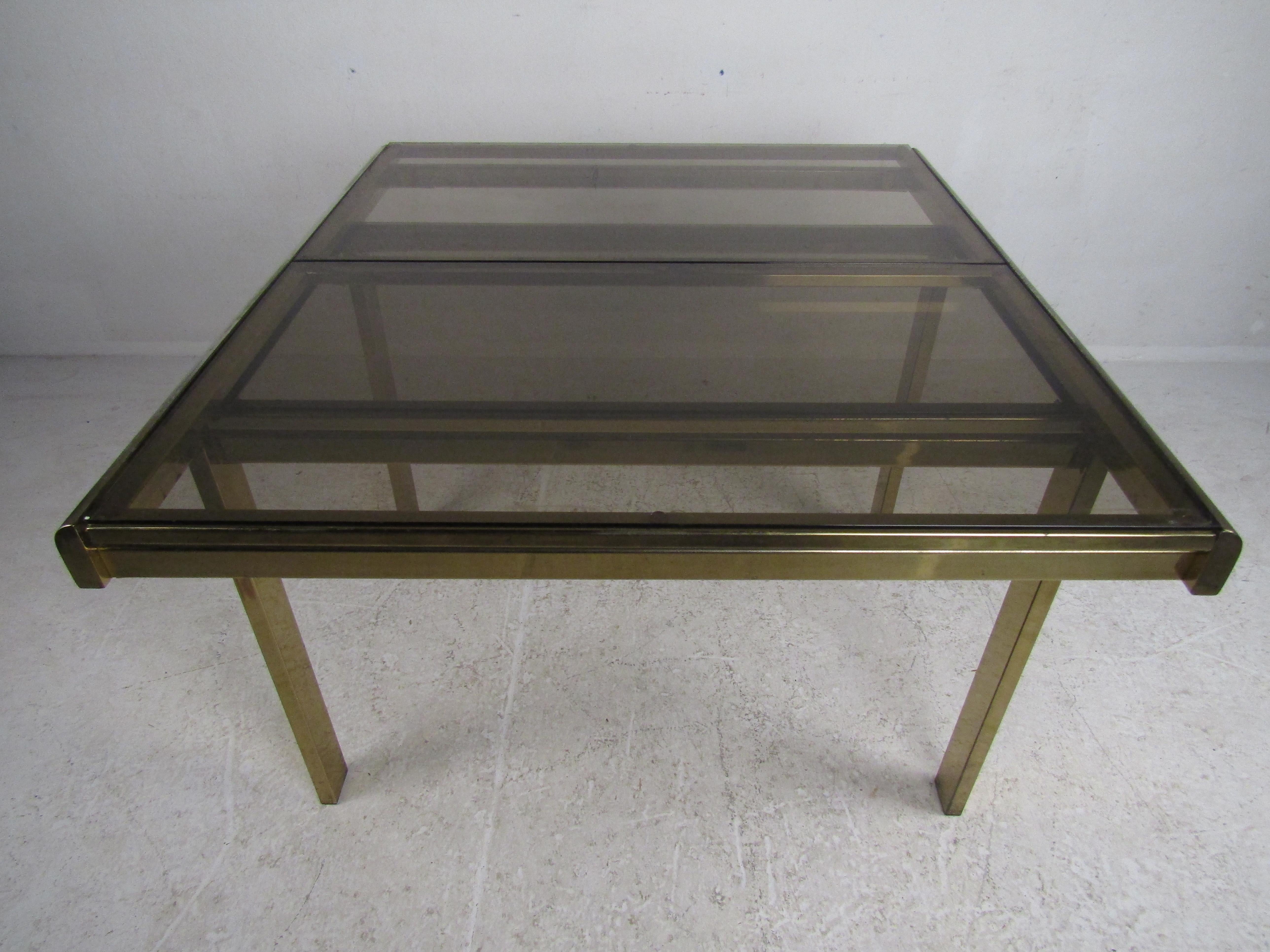 20th Century Mid-Century Modern Expanding Brass Dining Table with a Smoked Glass Top For Sale