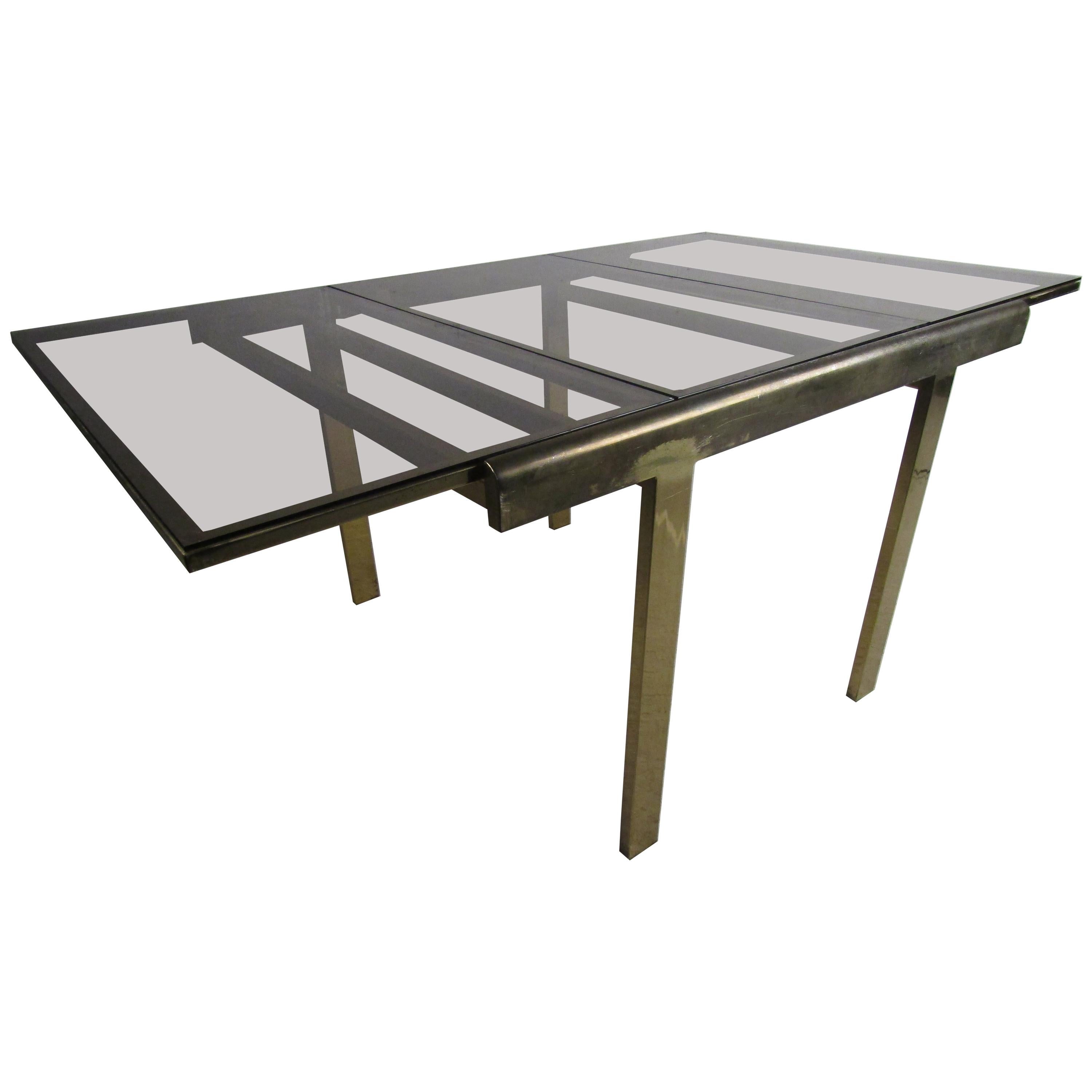 Mid-Century Modern Expanding Brass Dining Table with a Smoked Glass Top For Sale