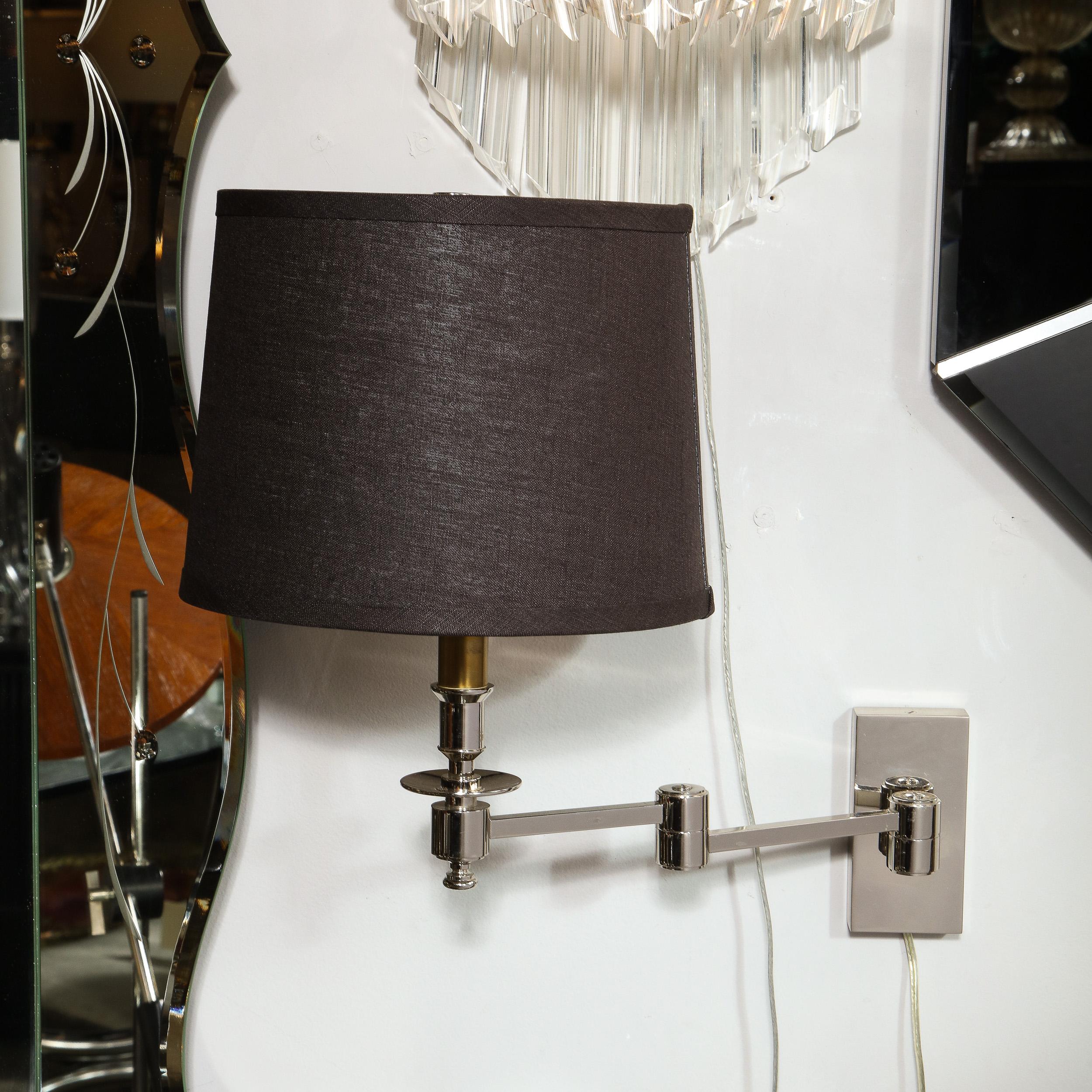 Mid-Century Modern Extendable Cantlivering Polished Nickel Wall Sconce In Excellent Condition For Sale In New York, NY