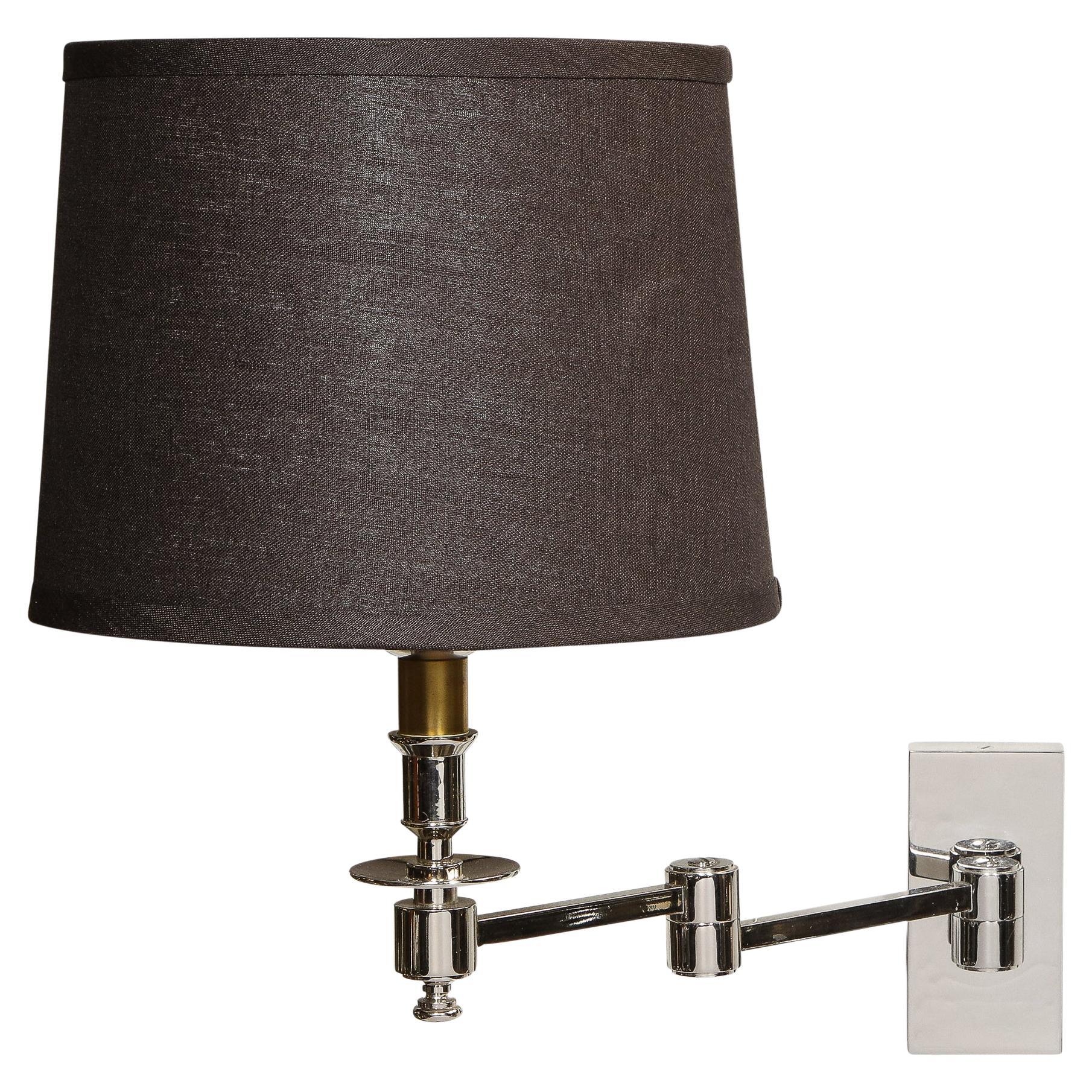 Mid-Century Modern Extendable Cantlivering Polished Nickel Wall Sconce