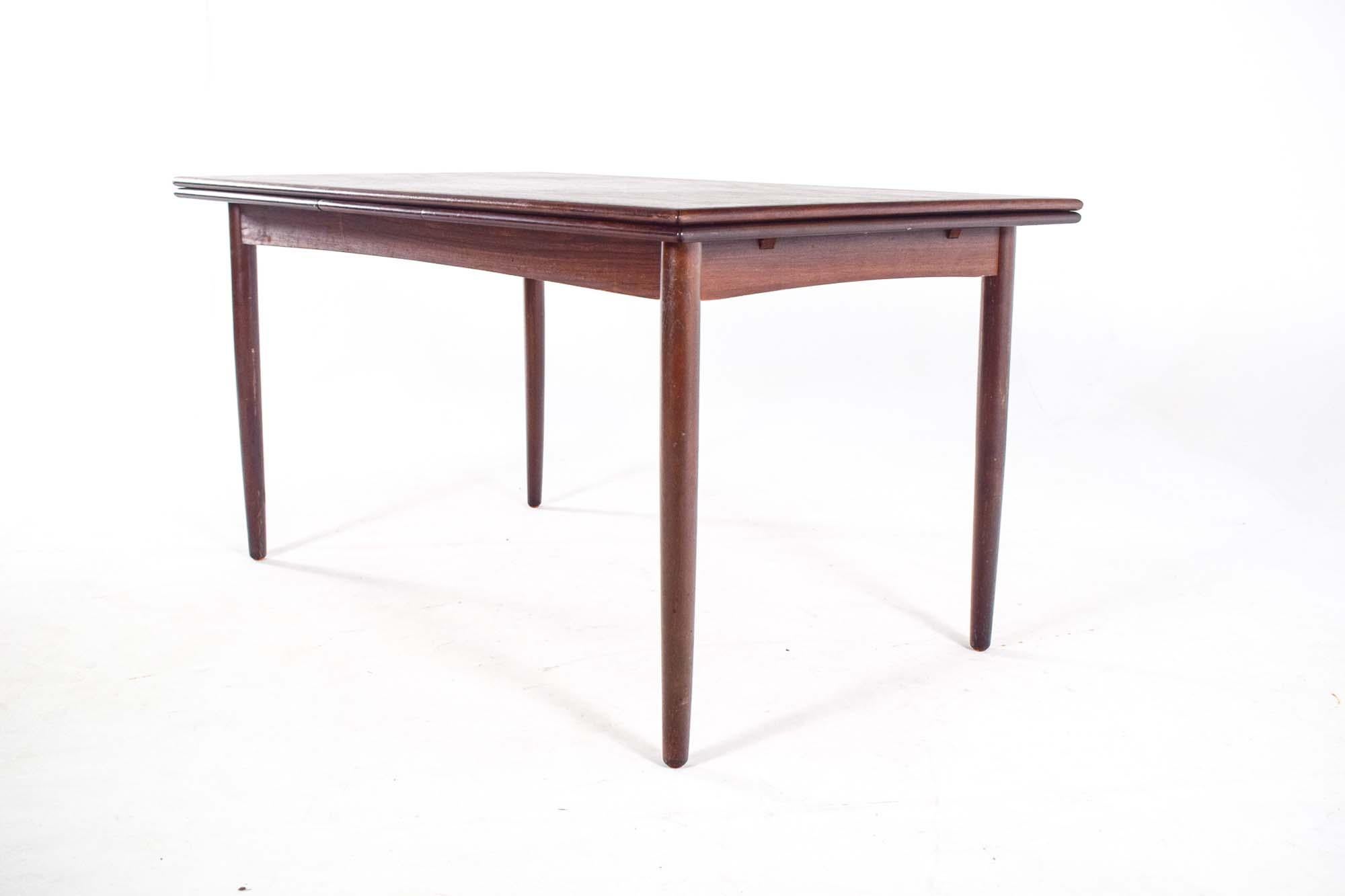 Mesa de comedor extensible de palisandro de mediados del siglo XX Moderno de mediados de siglo en venta