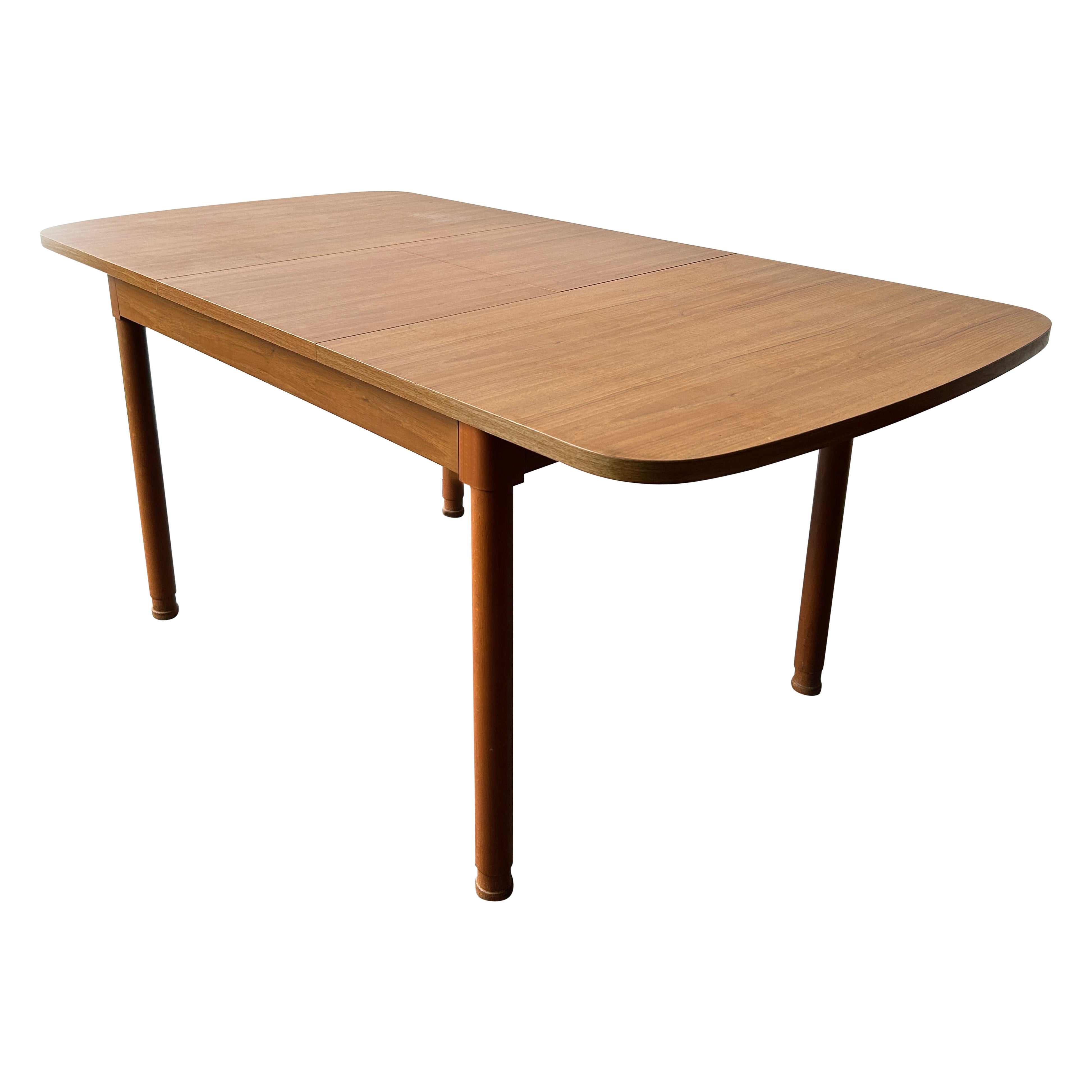 Mid-Century modern extending dining table by Schreiber Furniture