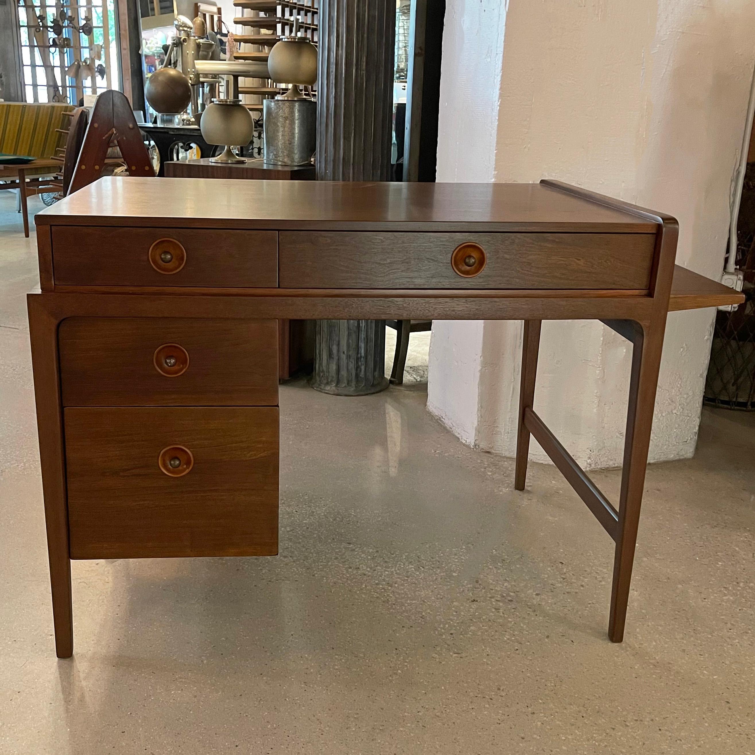Wonderfully detailed, Mid-Century Modern, walnut desk by John Van Koert for Drexel Counterpoint features 4 drawers with recessed pulls and a 6 inch side ledge that extends out to 22 inches. The desk is finished on the back as well. The chair