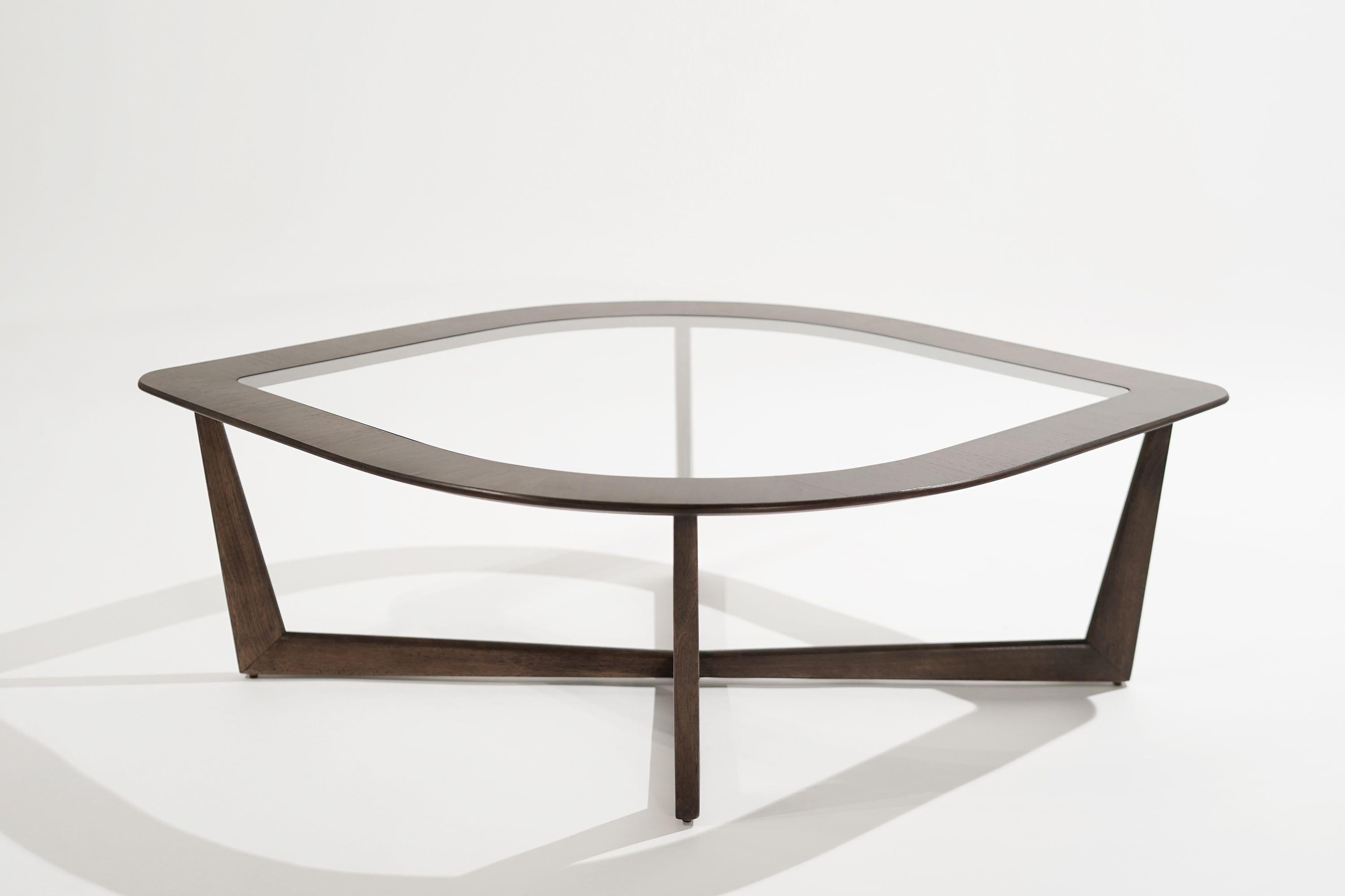 Sculptural coffee table, executed in walnut, circa 1950s. Walnut framework completely restored, new glass top.

Other designers from this period include Paul McCobb, Vladimir Kagan, Hans Wegner, Gio Ponti, and T.H. Robsjohn-Gibbings.