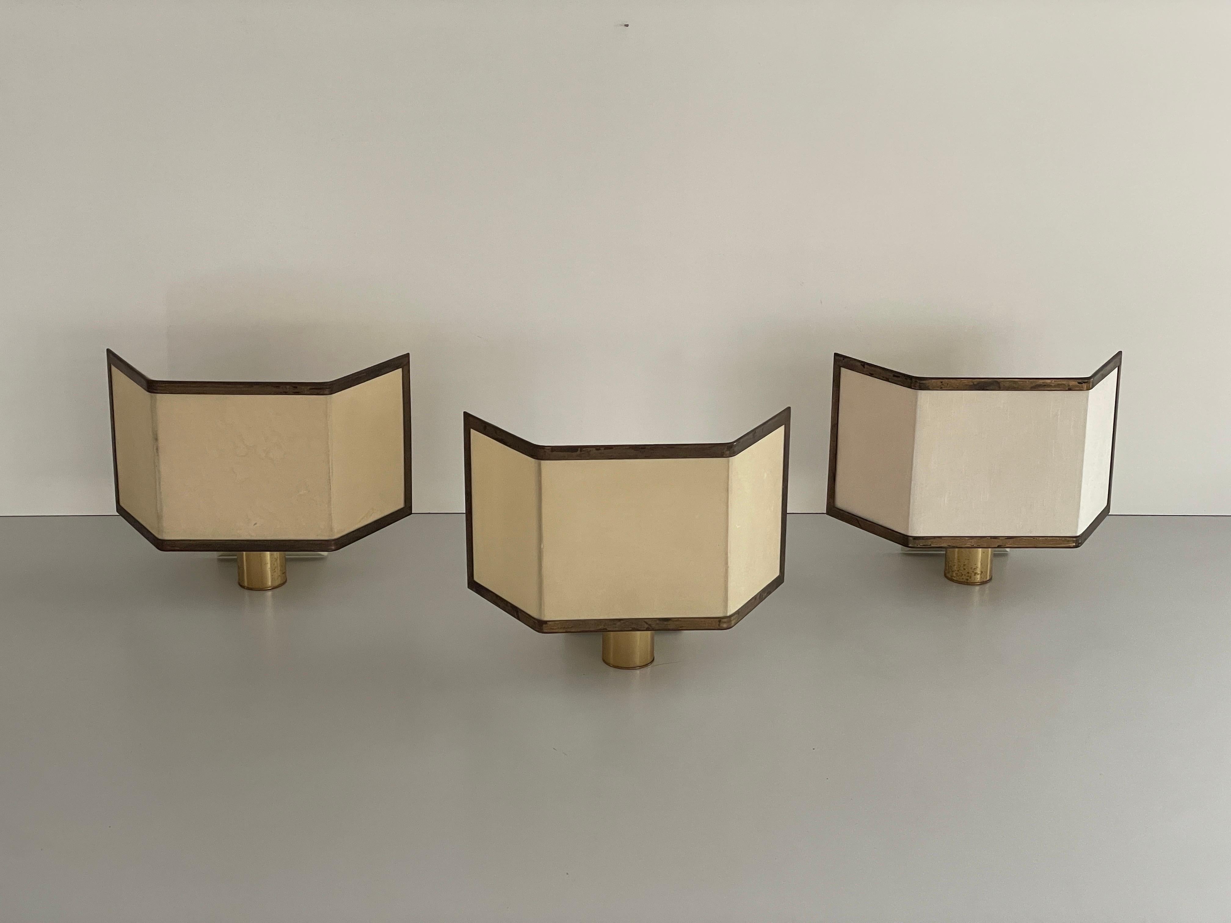 Mid-century Modern Fabric and Brass Set of 3 Sconces, 1960s, Italy

Lampshades are in very good vintage condition.


This lamp works with E27 light bulb. Max 100W
Wired and suitable to use with 220V and 110V for all