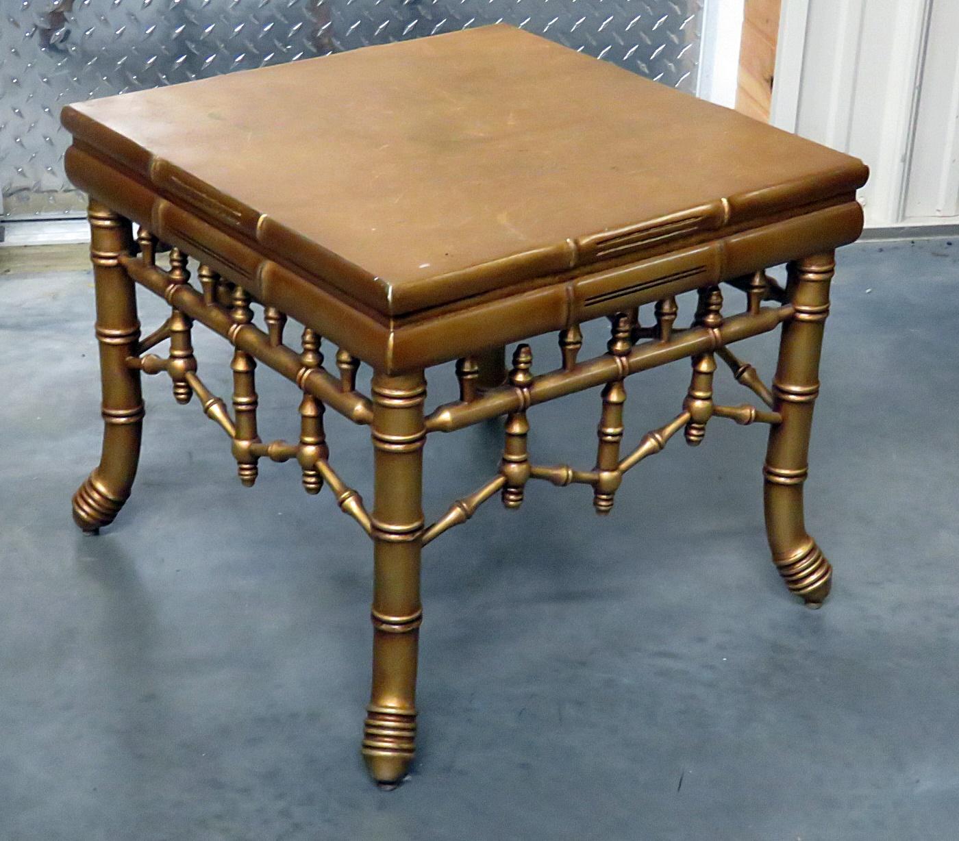 Mid-Century Modern faux bamboo side table with a distressed gilt finish.