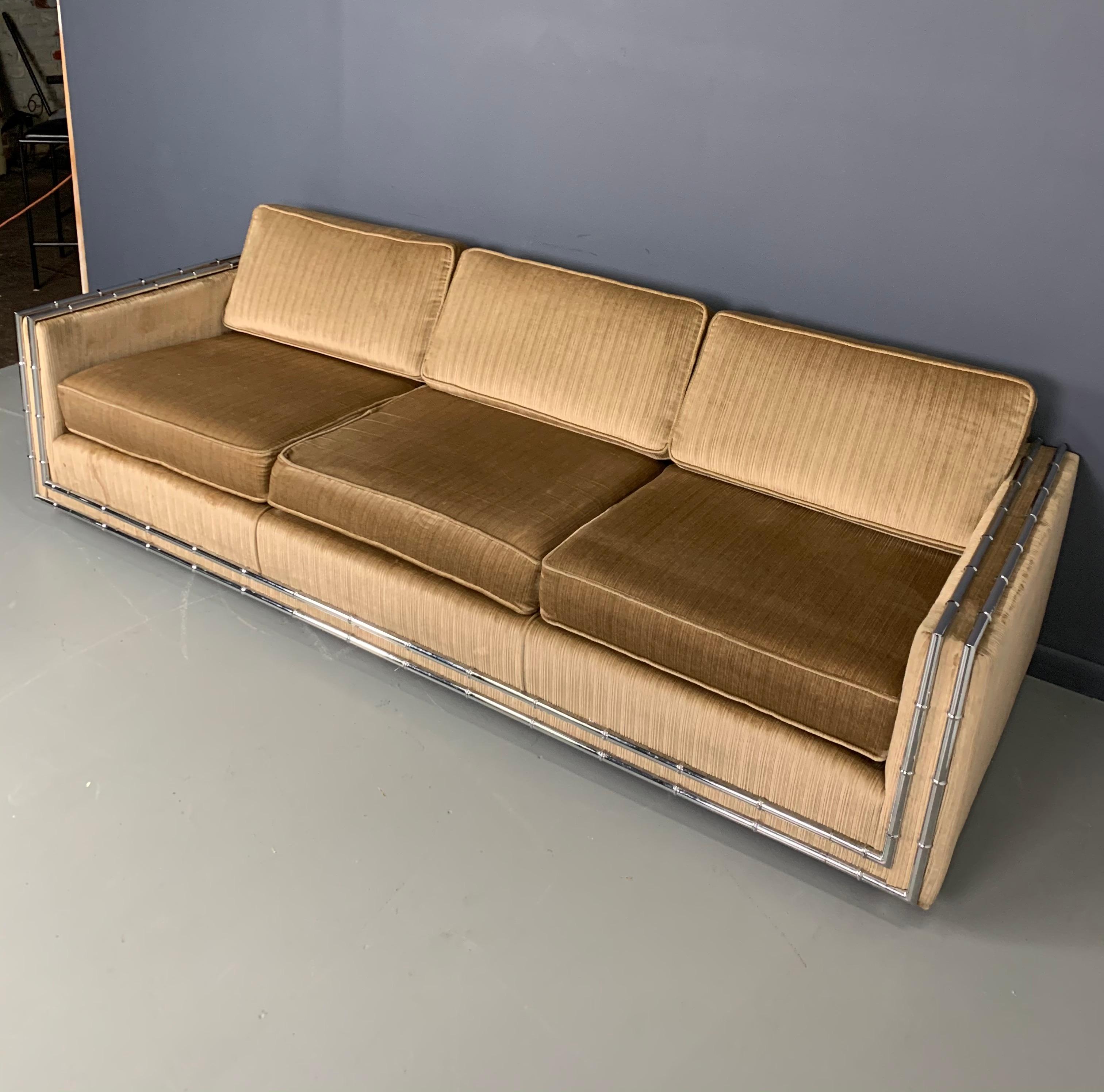 Generously sized sofa with a very cool double chromed bamboo frame.