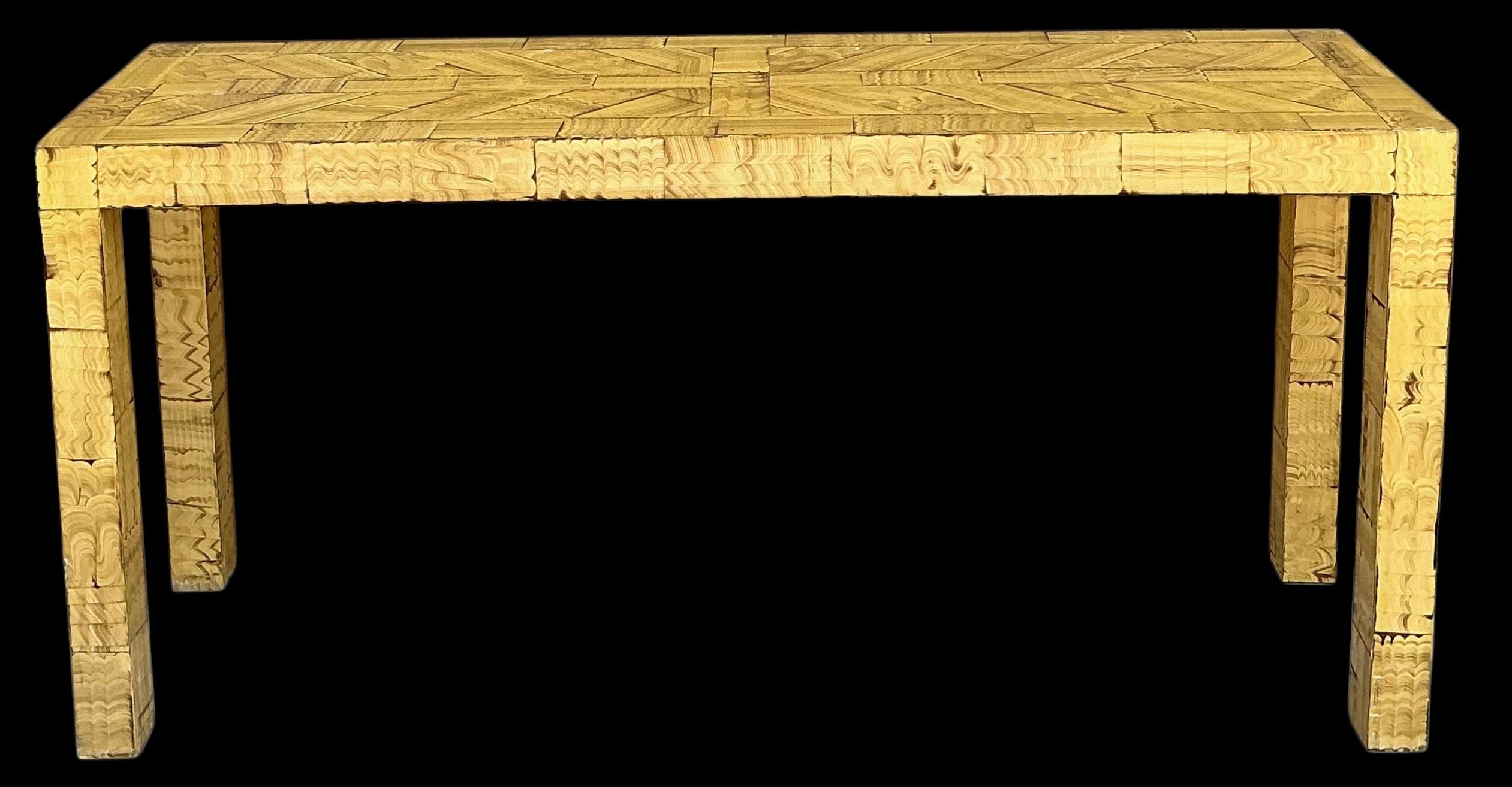 This is a mid-century modern fax painted Parsons style console table by Henredon. The finish is an artistic interpretation of grain painting. It has a fabulous look! The versatile size, clean lines, and unique finish make it  a special piece. 