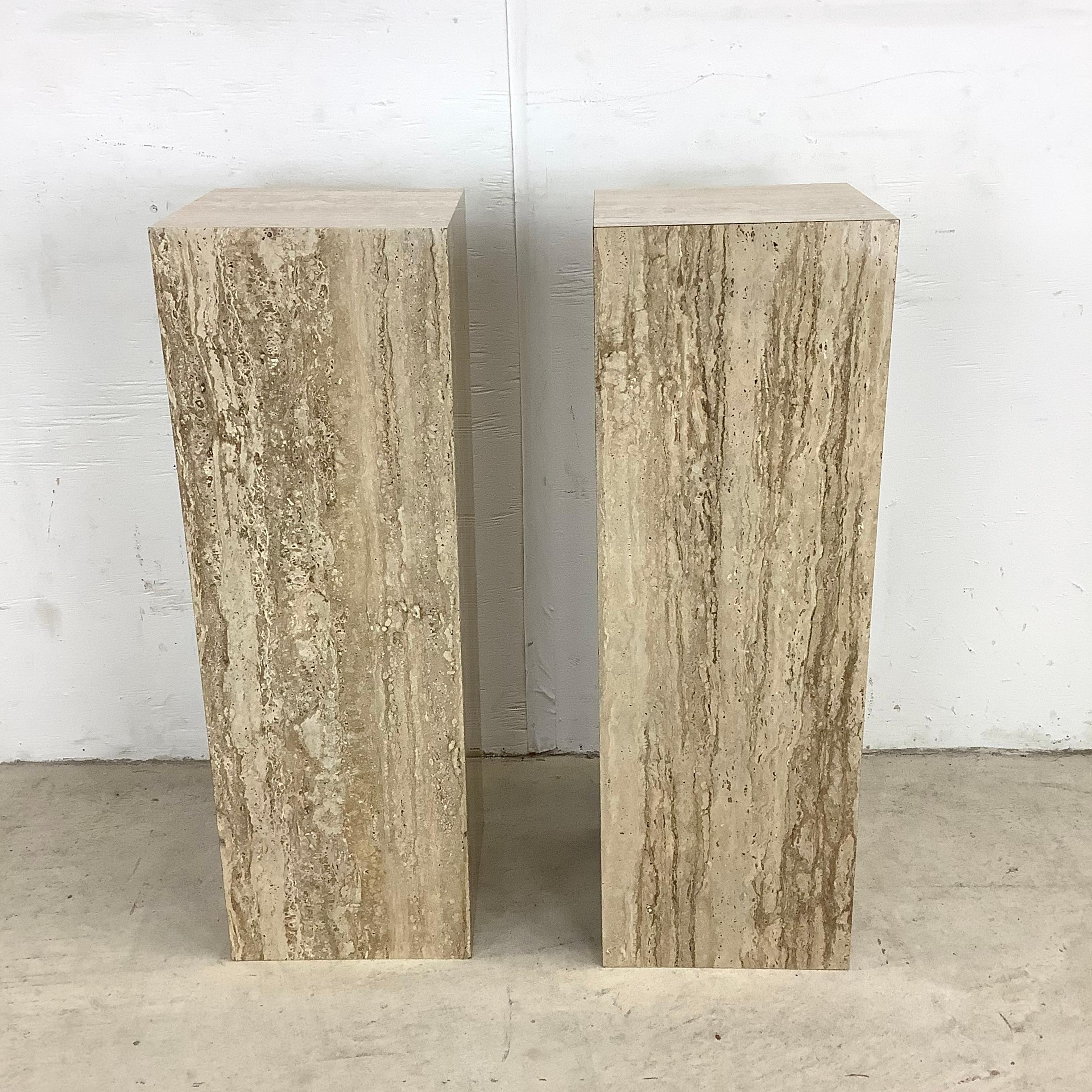 This matching pair of vintage modern display pedestals feature durable faux stone laminate finish and clean modern lines. The pair stands thirty inches tall and make an ideal set of accent display tables for home or office, perfect for vase or