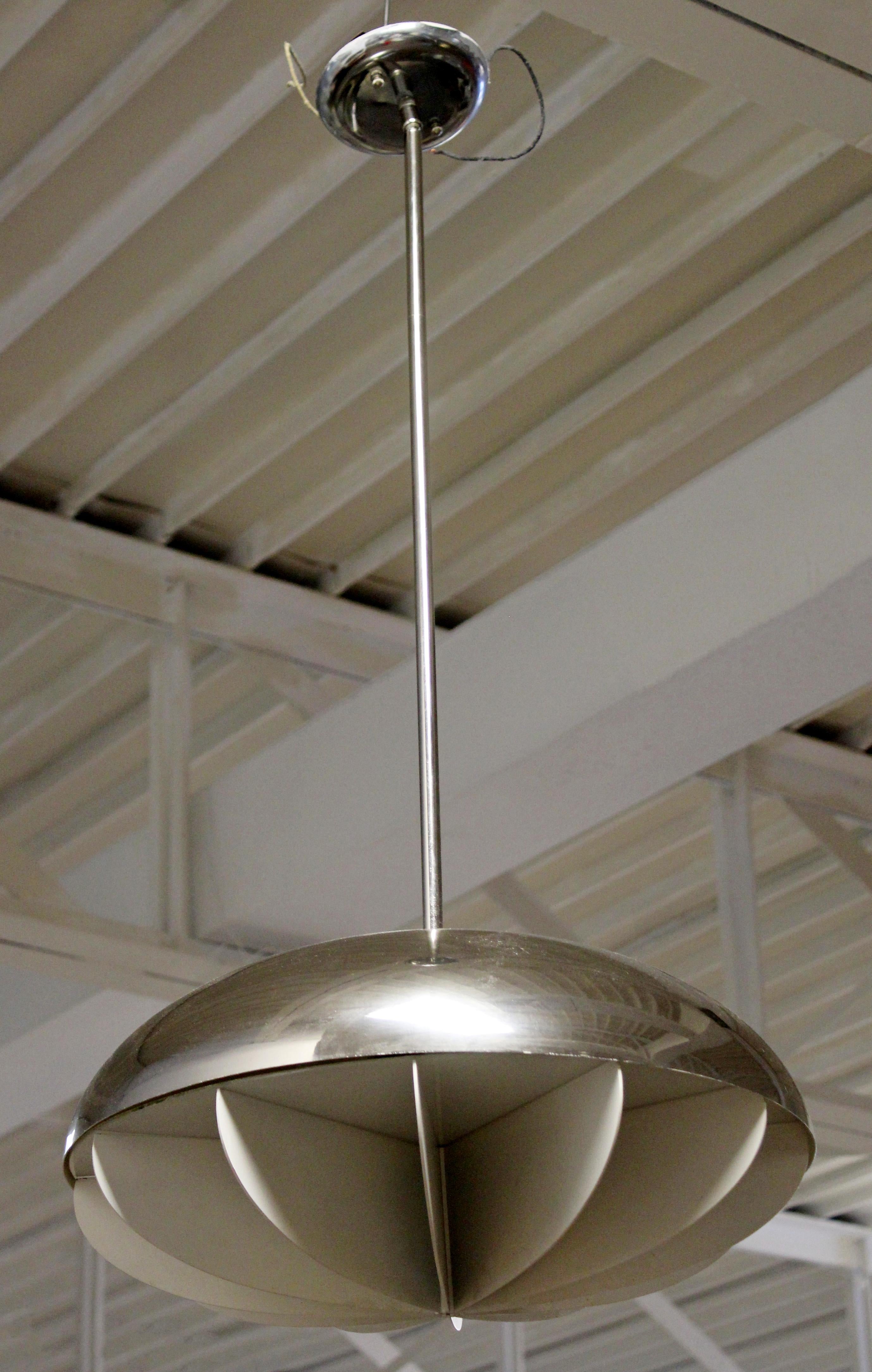 For your consideration is a simplistic, chrome dome pendant light fixture or chandelier, by Feldman, circa 1960s. In good vintage condition. The dimensions are 16