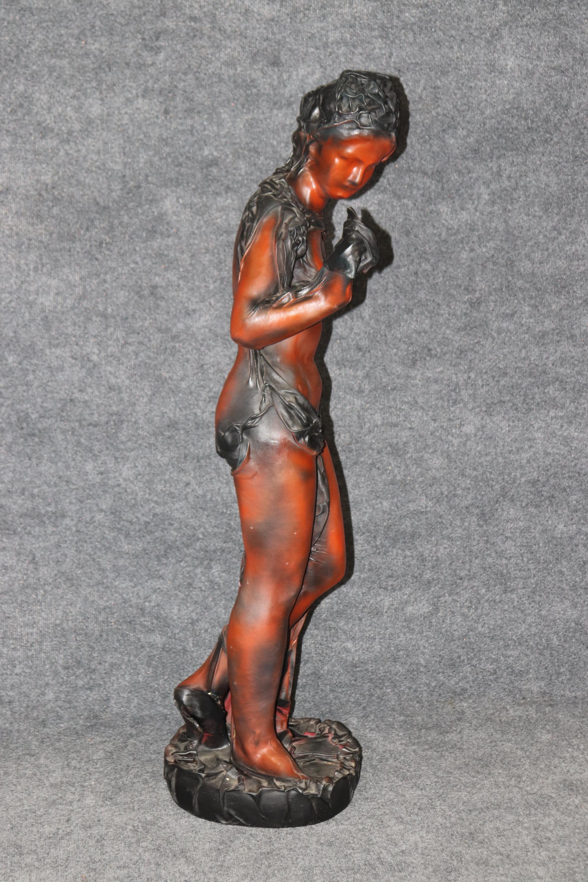 Dimensions- H: 44 1/2in W: 13in D: 11in

This vintage leather wrapped sculpture of a woman by Daphne Du Barry is made of the highest quality! Daphne du Barry is a Dutch sculptor who was born on 5 July 1950. Daphné Du Barry exhibited her bronze