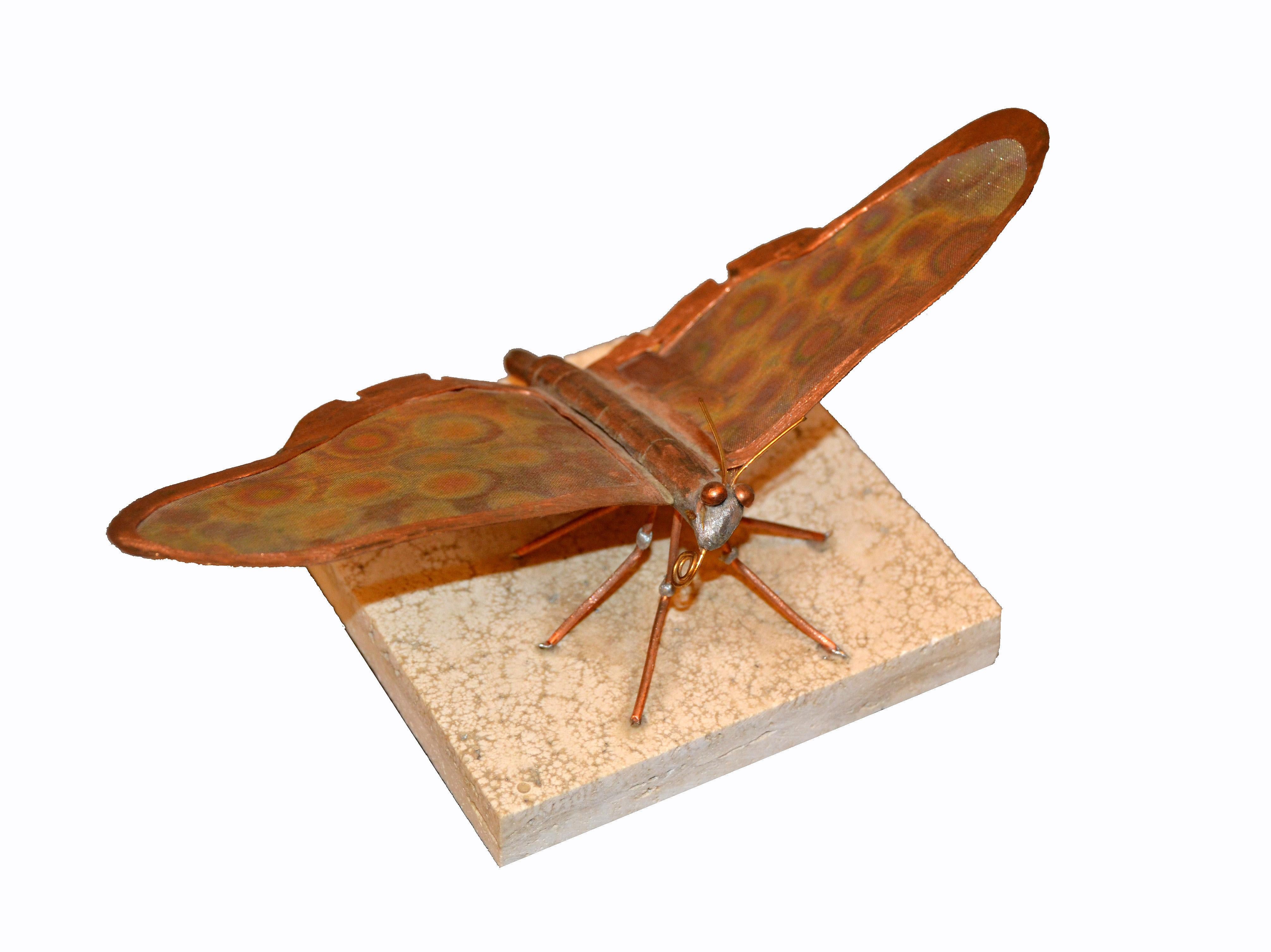 Unique Mid-Century Modern handcrafted Fine Art sculpture shaped butterfly in copper on a terracotta tile.
Great craftsmanship.