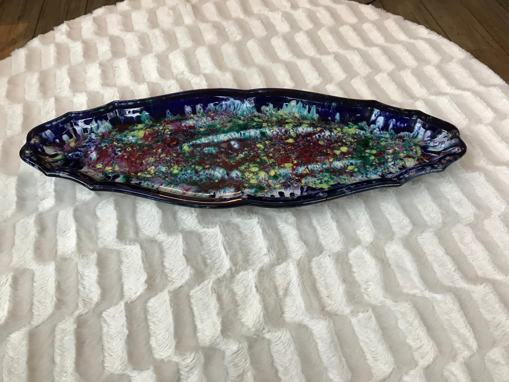 Beautiful and large Mid-Century Modern fish serving plate in vallautis ceramic signed by Morvan. Great combination of colors. France, 1950s
In an excellent condition.
  