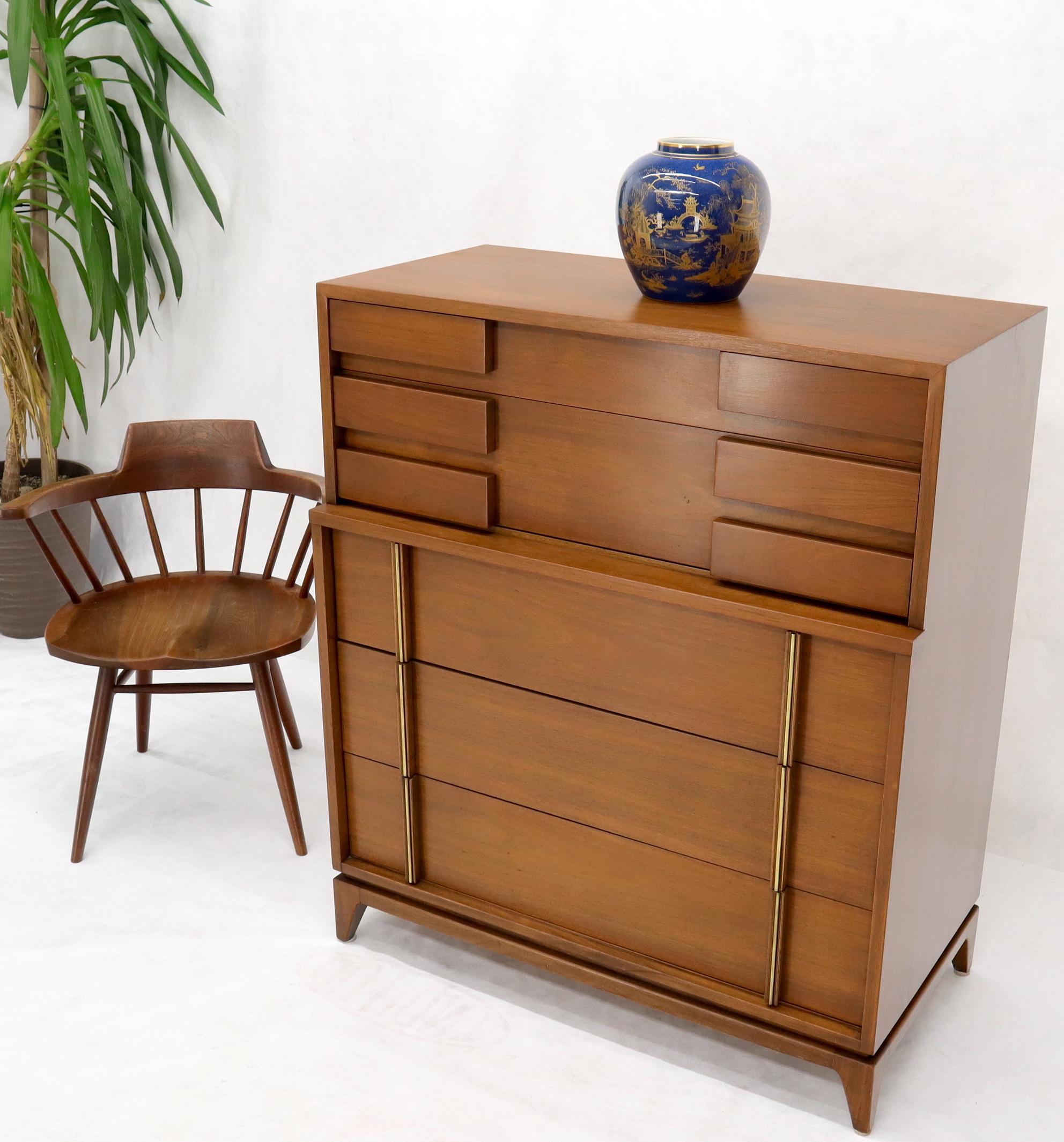 American of Martinsville Mid-Century Modern walnut high chest dresser with block front drawers and brass accents.