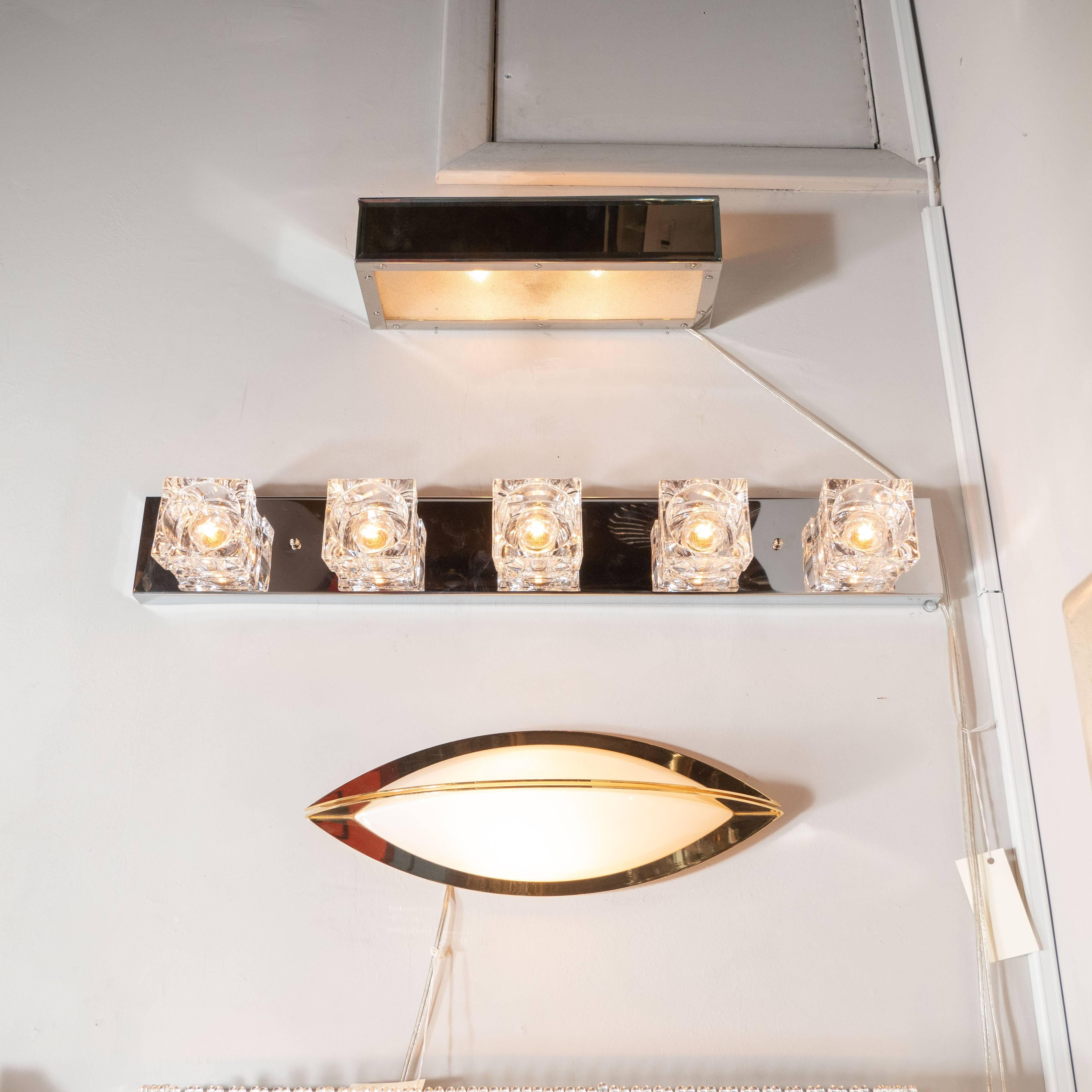 This stunning vanity light was realized by the fabled Italian designer, Sciolari, circa 1970. Part of their iconic 
