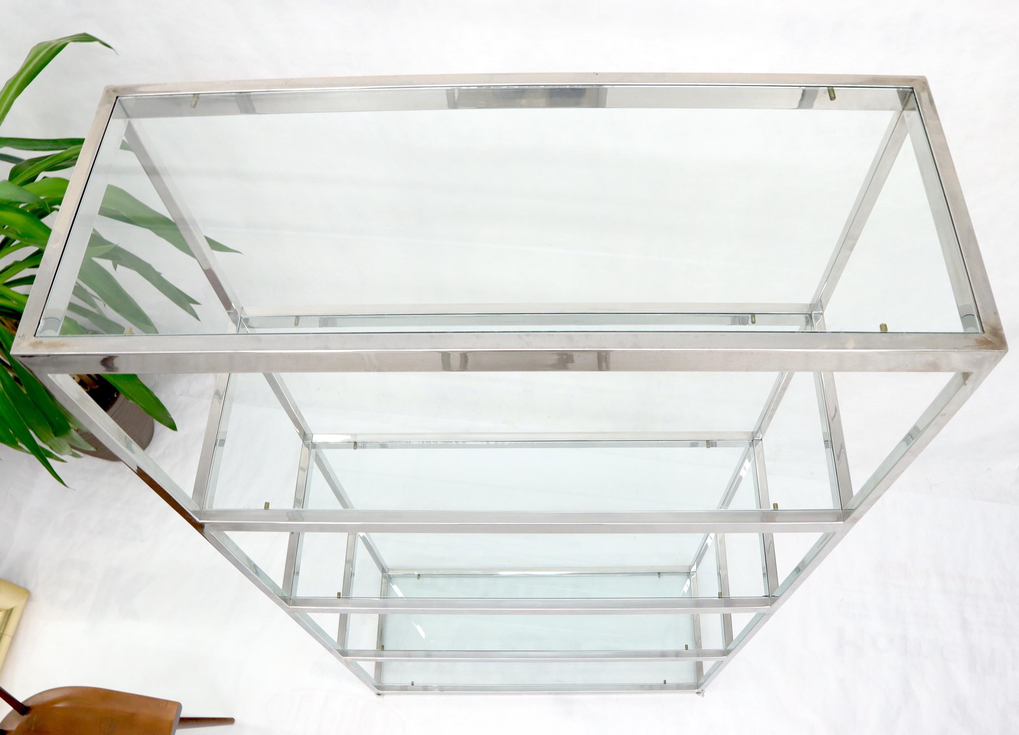 chrome glass shelving unit