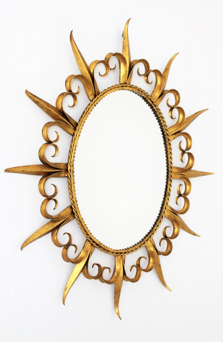 MidCentury Modern FleurdeLys Gilt Iron Sunsburst Mirror, Spain