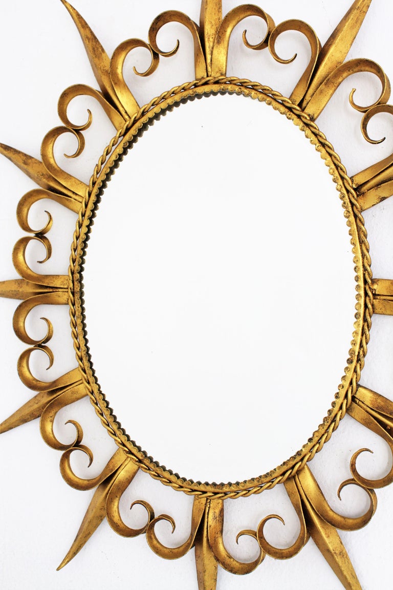 MidCentury Modern FleurdeLys Gilt Iron Sunsburst Mirror, Spain