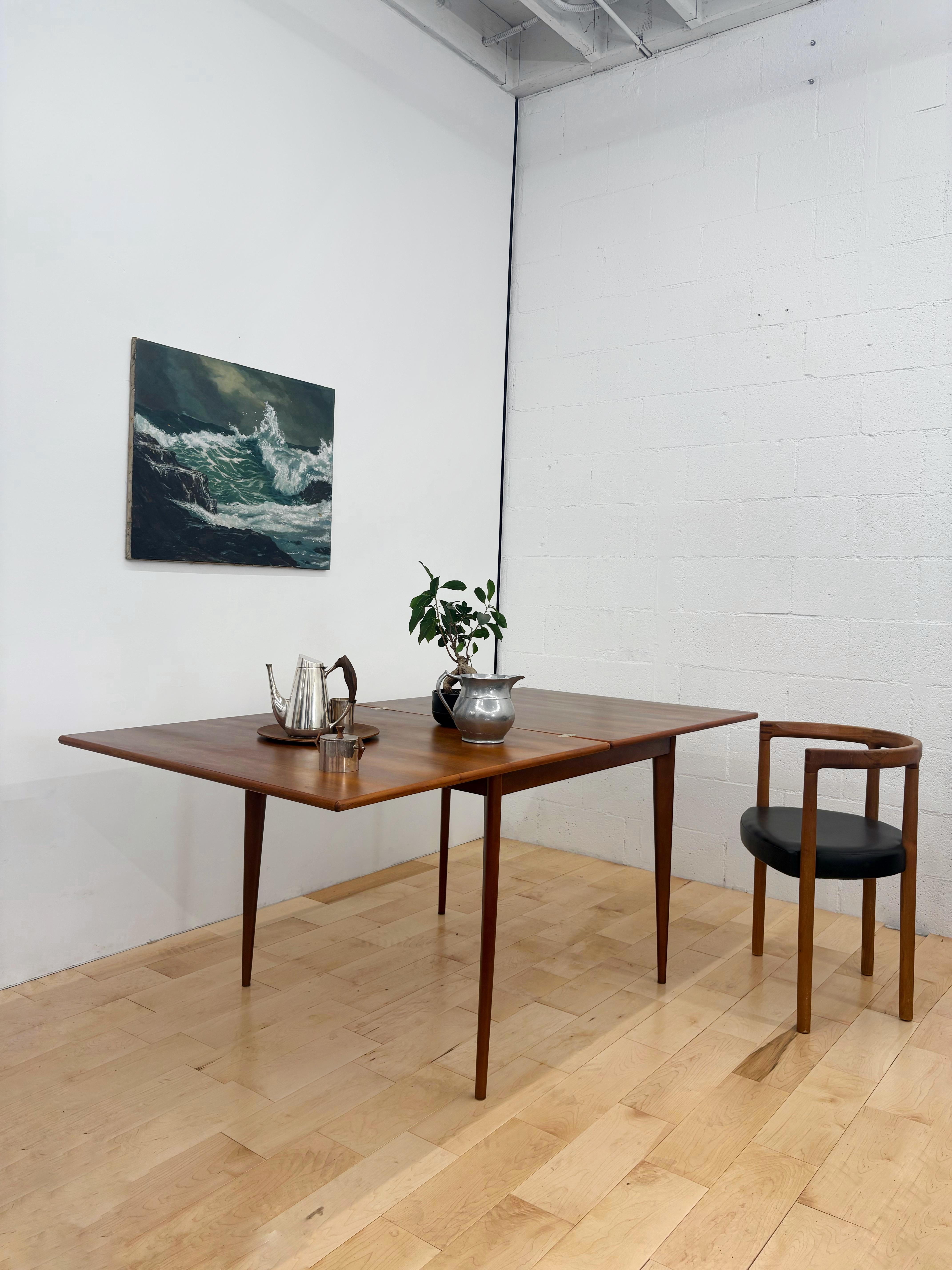 Mid Century Modern Flip Top Teak and walnut expandable Dining Table by Vetlanda In Good Condition In Los Angeles, CA