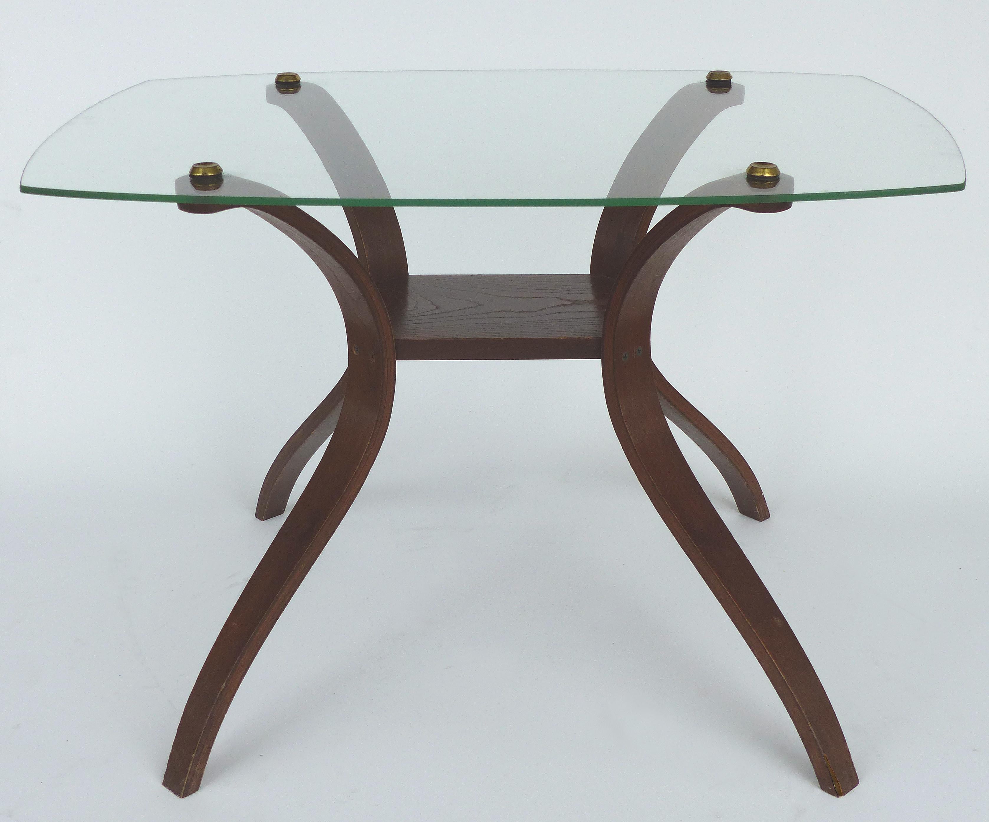 Mid-Century Modern Floating Glass, Brass and Bentwood Side Tables, Pair

Offered for sale is a pair of Mid-Century Modern bentwood side table with floating glass tops that are secured with brass decorative caps. These very 