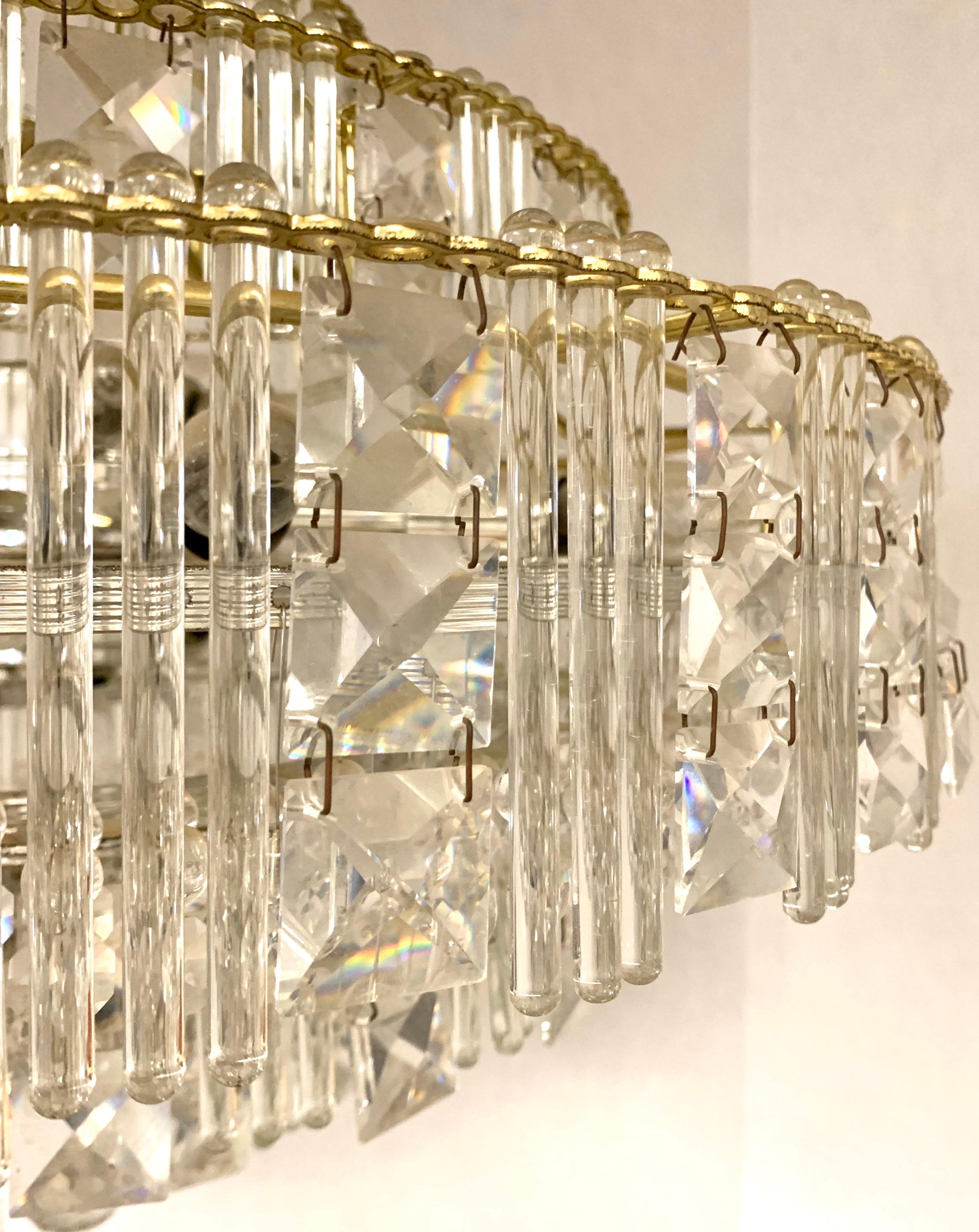 Elegant, mid century three tiered floating crystal chandelier. Sometimes referred to as 