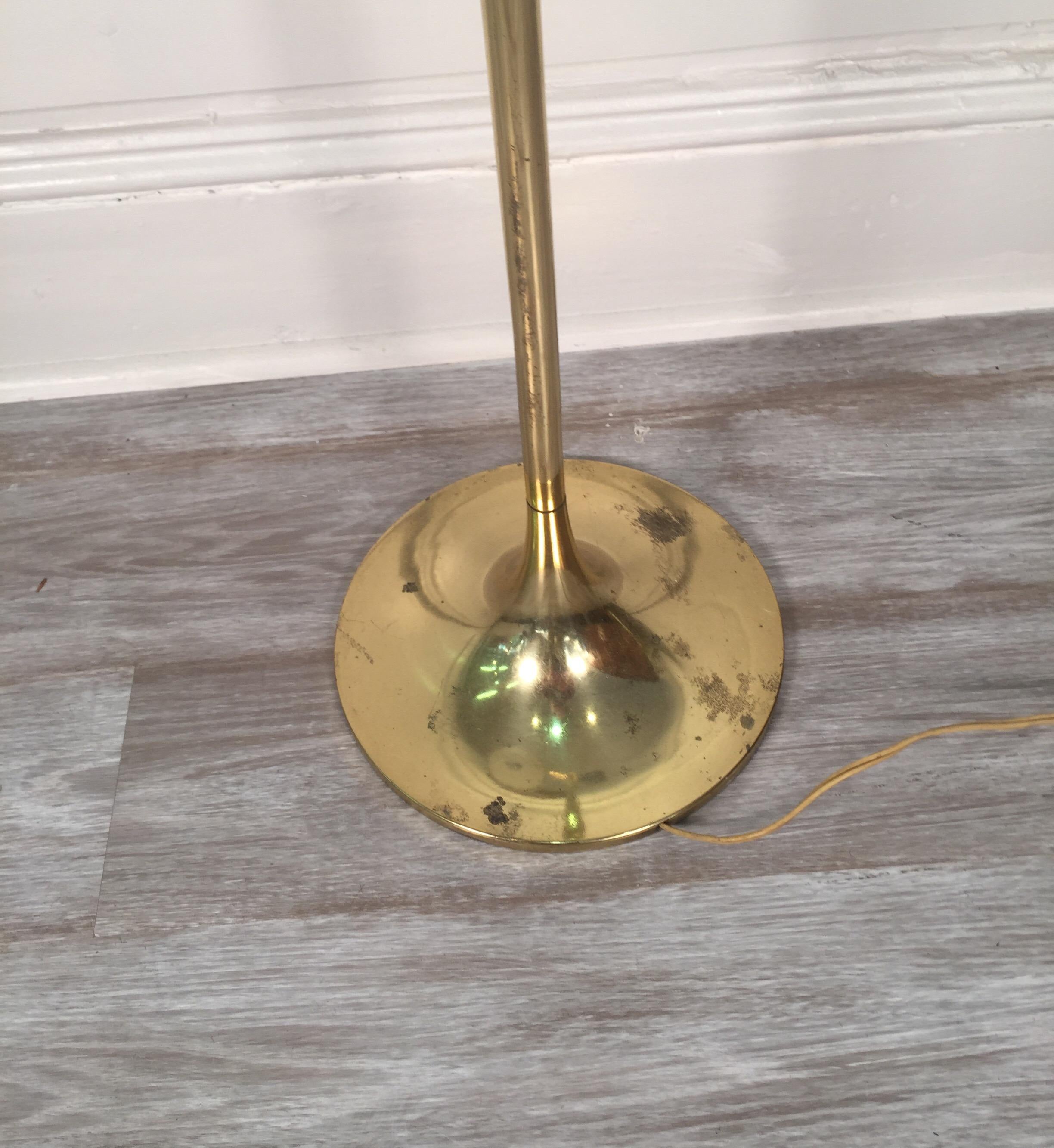 Brass floor lamp featuring adjustable height and arm for Laurel Lamp Company, 1950s.