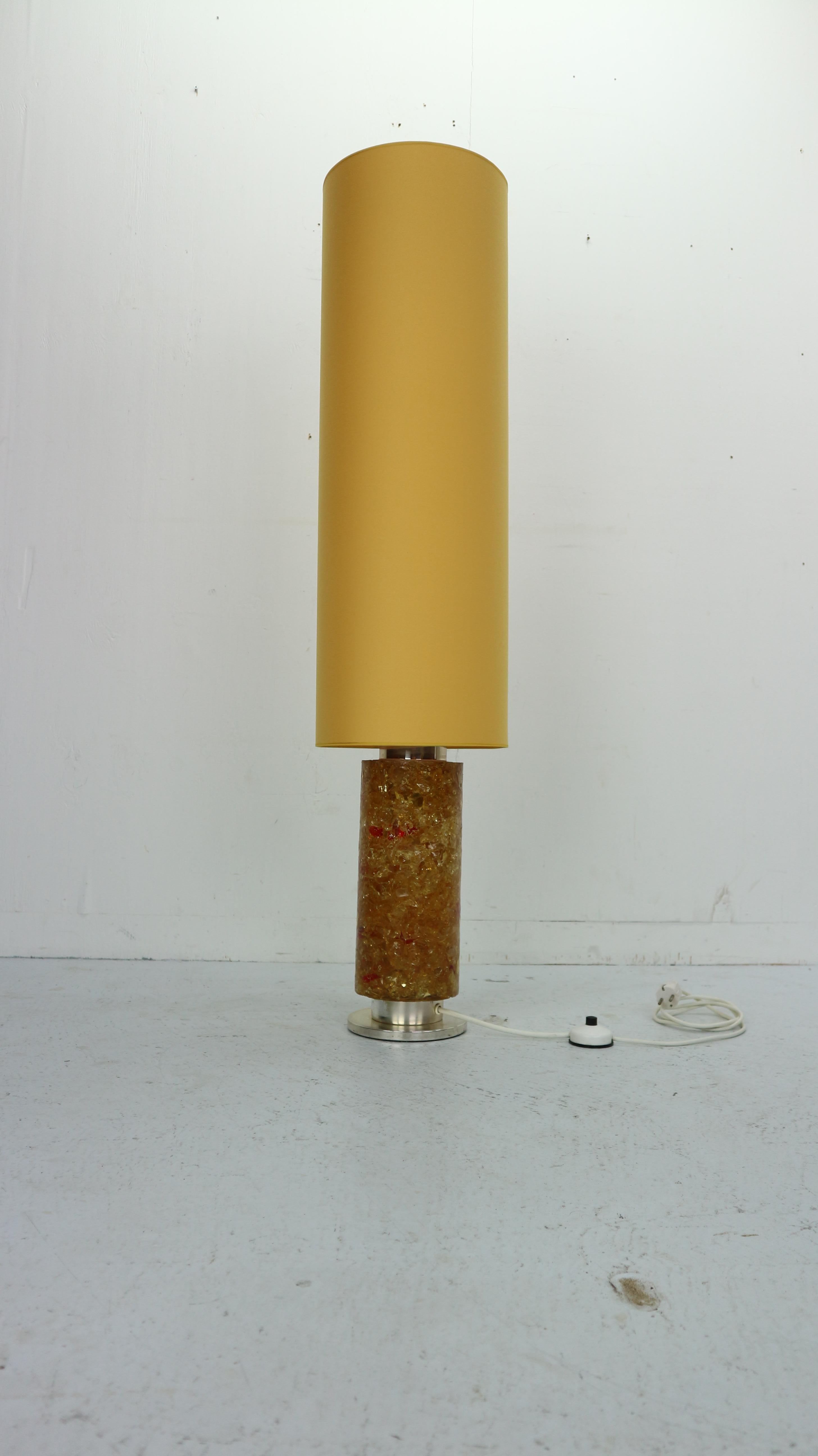 Mid-Century Modern design vintage floor lamp made in 1970s Belgium.
Warm amber color lamp stand is made from epoxy glass.
Lamp shade has been newly reupholstered in yellow color fabric.
  