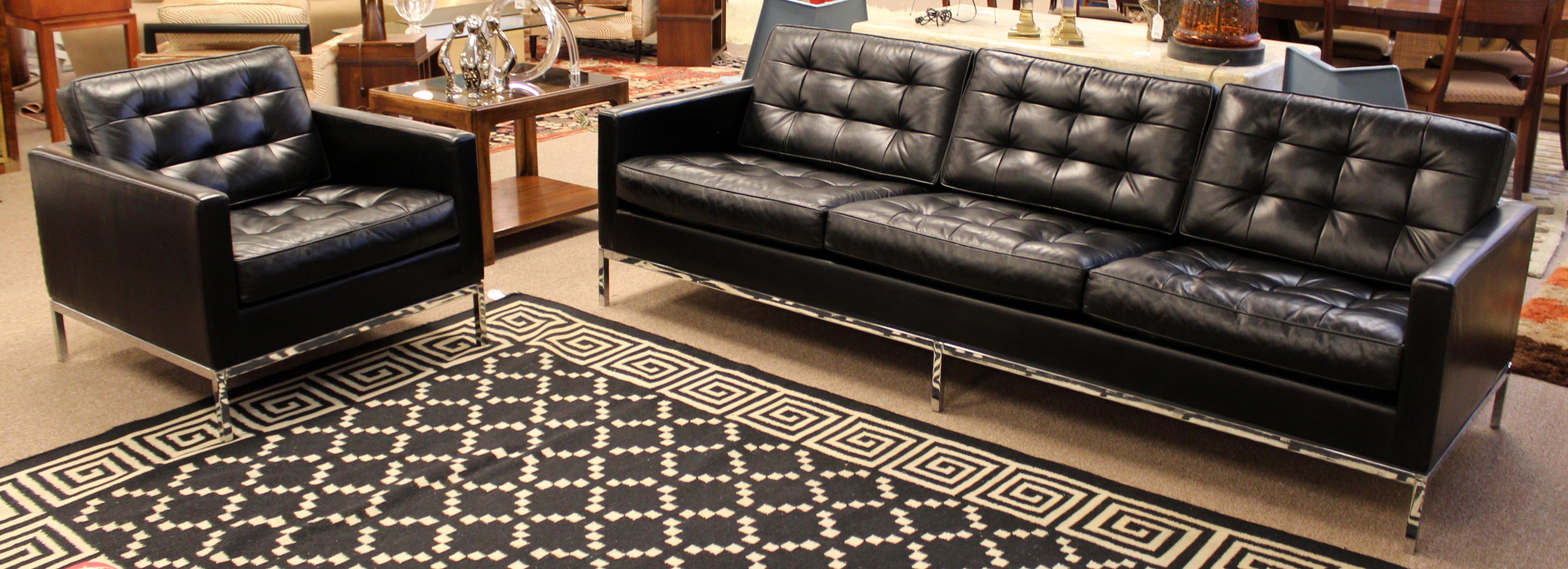 black tufted leather sofa