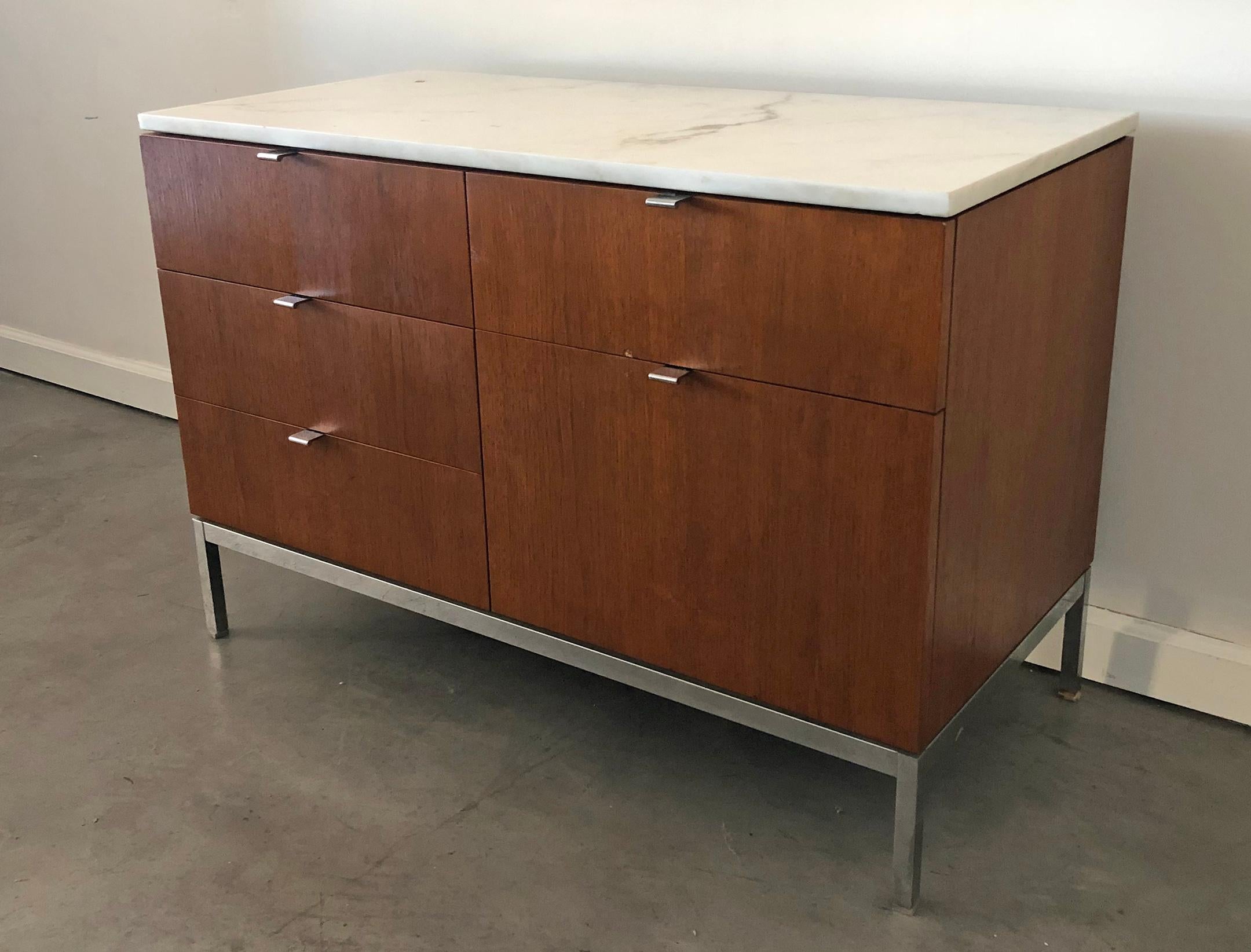 Another great find! This midcentury Florence Knoll Credenza is in great shape with a Carrera marble top. Both sides of this piece are finished, so it can 