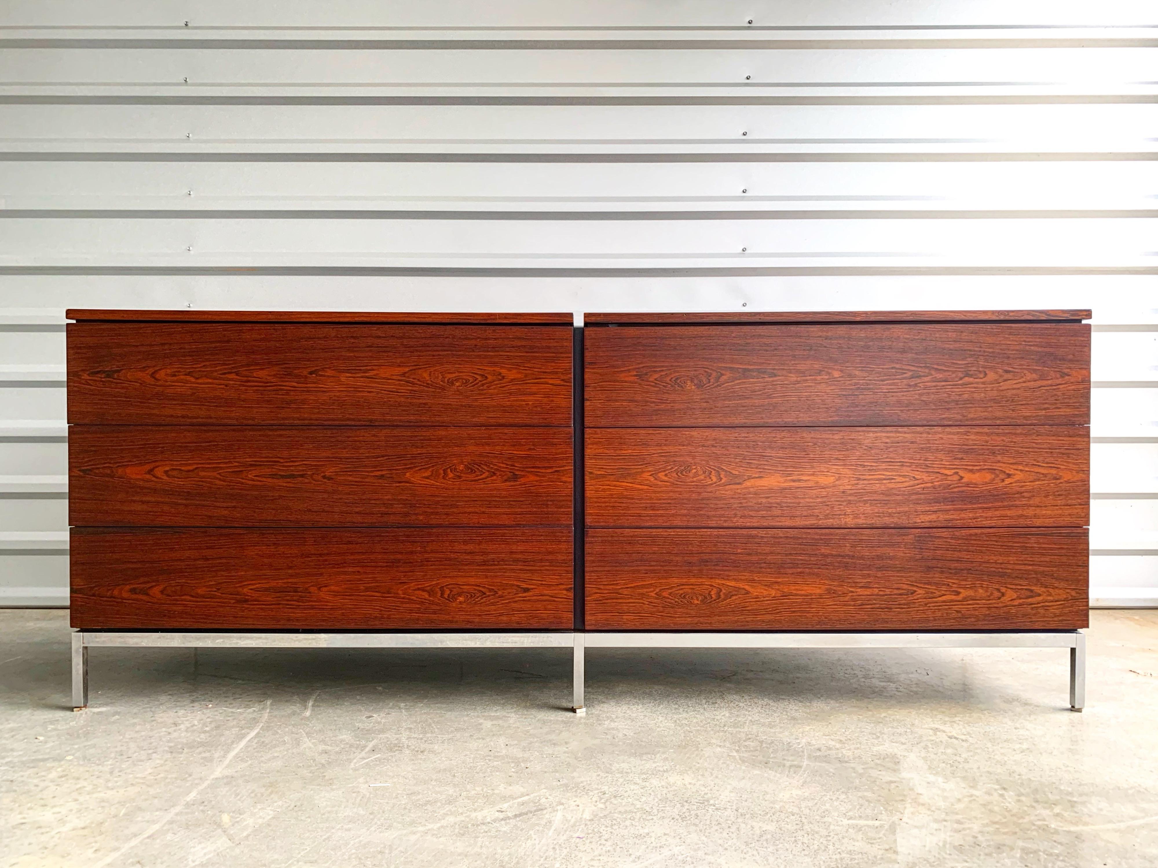 Florence Knoll six-drawer dresser in Brazilian rosewood and chrome. Exquisite example, circa 1950s. Highly figured bookmatched grain. Drawers retain original dividers and sliding tray.
This piece has been expertly restored. It is 65+ years old and