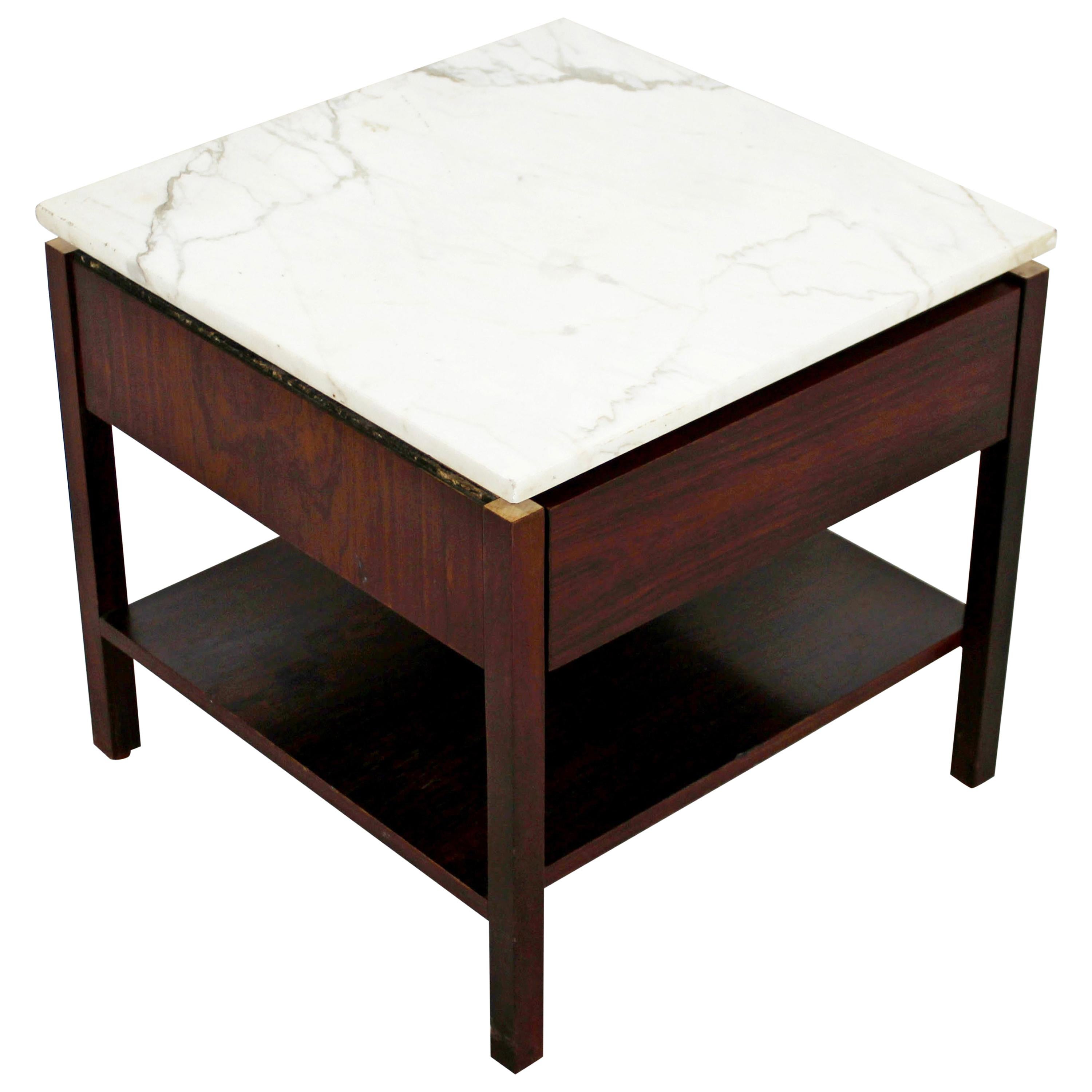 For your consideration is a sweet, marble topped, rosewood side table or nightstand, with one-drawer, by Knoll, circa 1960s. In good vintage condition. The dimensions are 19.5