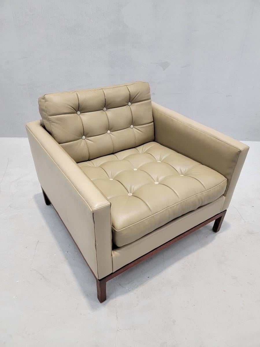 Mid Century Modern Early Florence Knoll Style Button Tufted Club Lounge Chair with Walnut Frame Newly Upholstered in High End Holly Hunt Tan Leather

This cube club chair would be a comfy addition to your living or office space. The piece has both