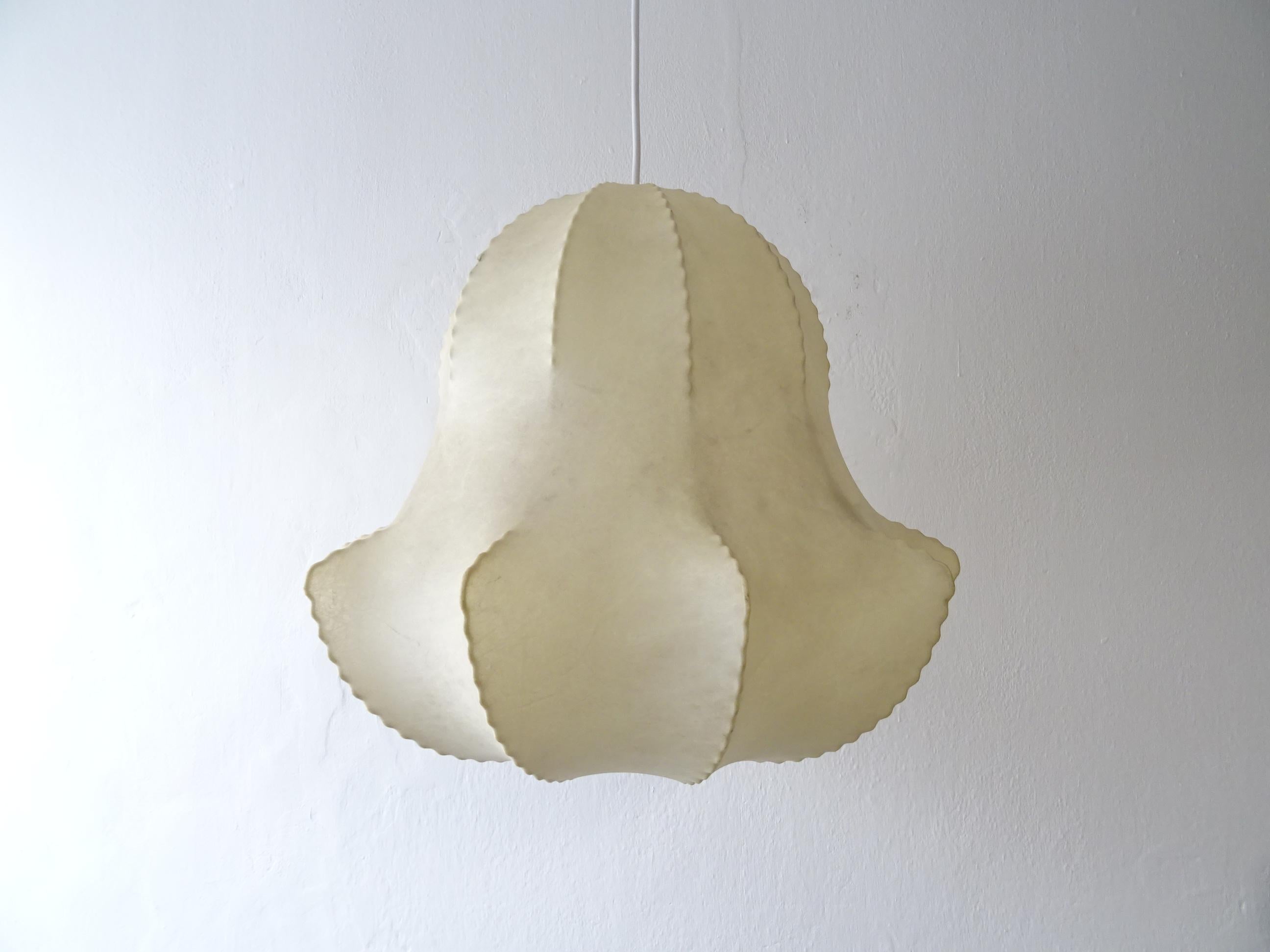 Rare large size pendant from Flos by Achille & Pier Giacomo Castiglioni. Has been newly wired with certified US UL E26 socket (100 Watts) for the USA. Lamp shade made of original resin. Has three tiny holes over the enamel metal as shown, but not