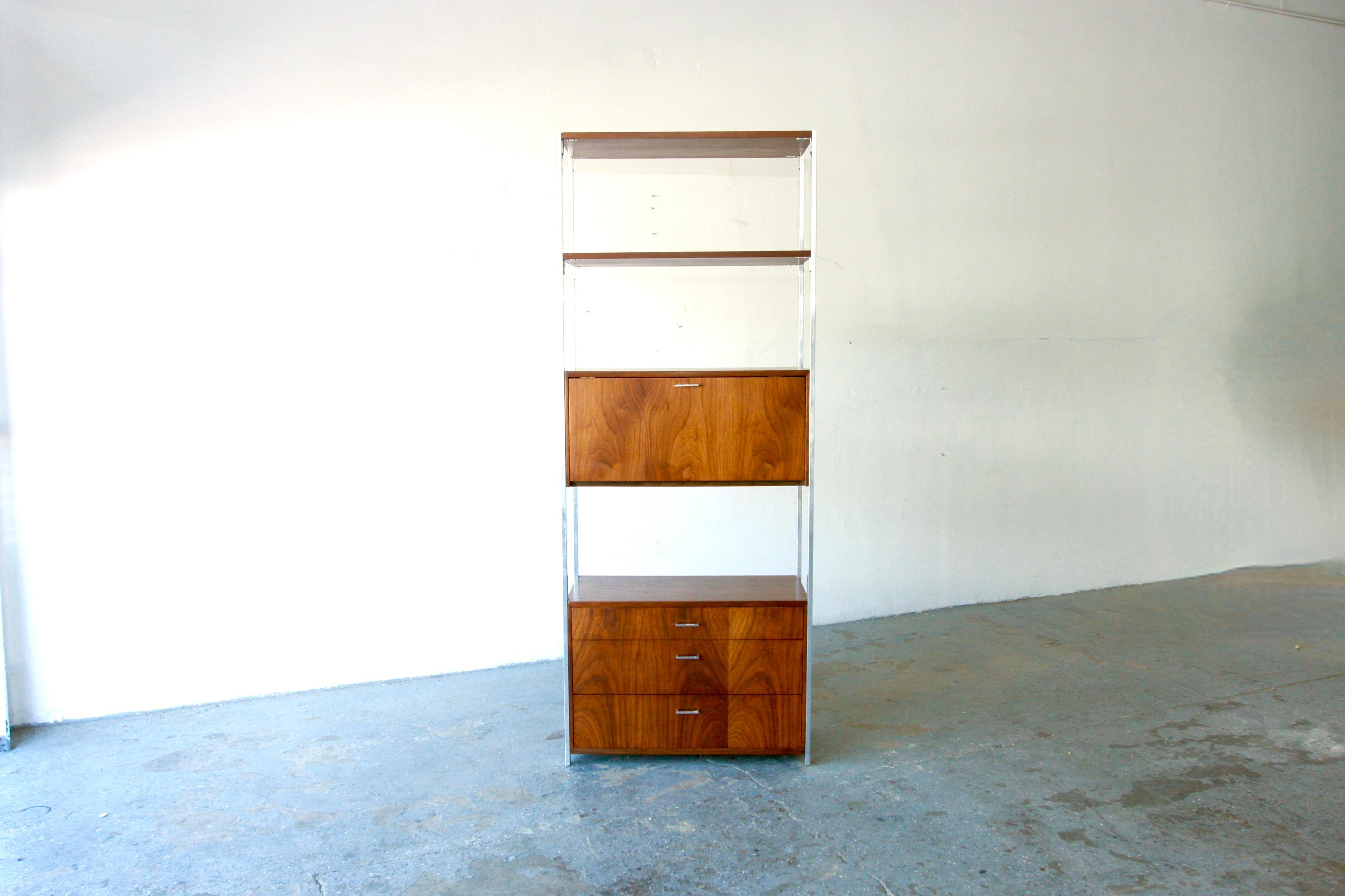  Mid-Century Modern Founders Chrome & Walnut Etagere. Featuring a straight line design, floating walnut chest of three drawers, bar and  walnut shelves, chrome pillars, and original chrome hardware. This is an exceptional combination of quality and
