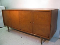 Mid-Century Modern Four-Door Black Figural Walnut Credenza