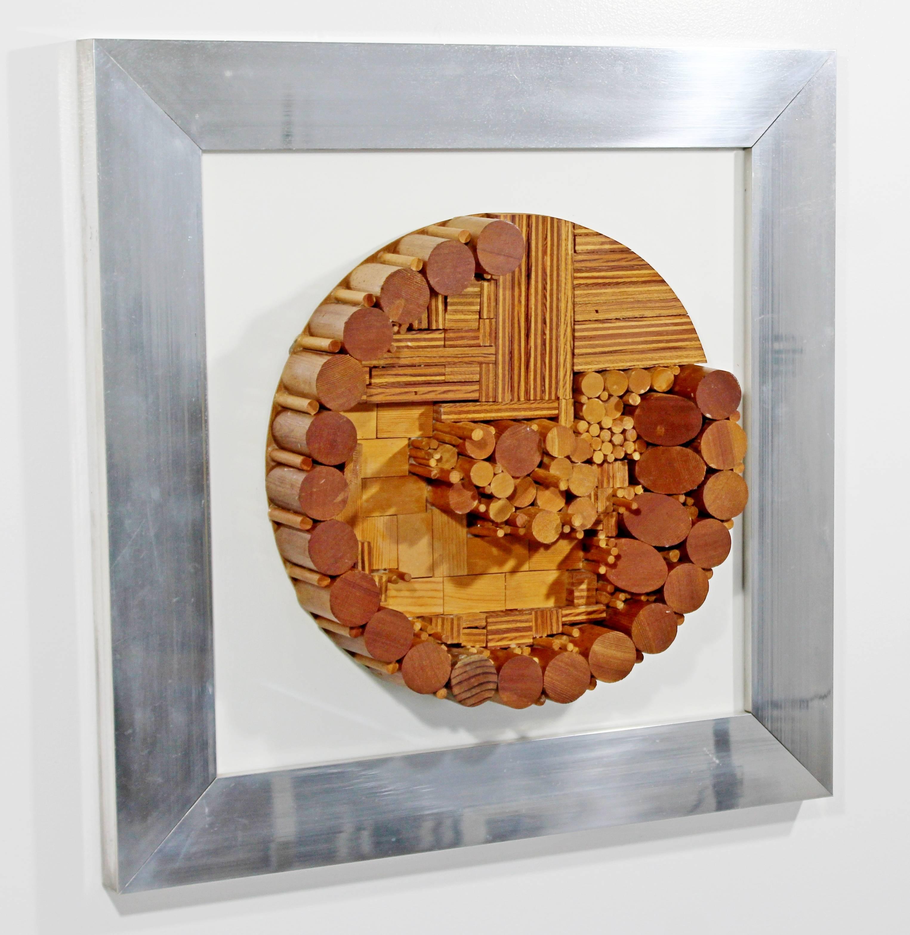 For your consideration is a framed, dynamic, dimensional wood art sculpture by Greg Copeland, circa the 1970s. In excellent condition. The dimensions of the frame are 23.5
