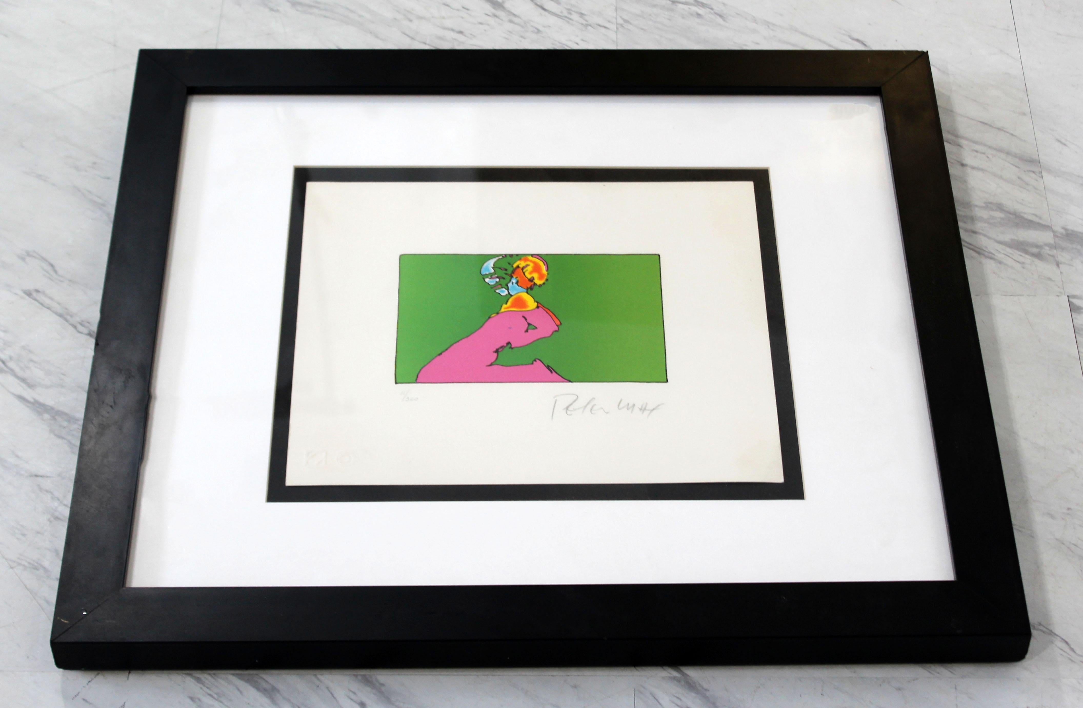 For your consideration is a marvelous, framed lithograph, of a pink figure against a green background; signed, stamped and numbered by Peter Max, 11/300. In excellent condition. The dimensions of the frame are 23