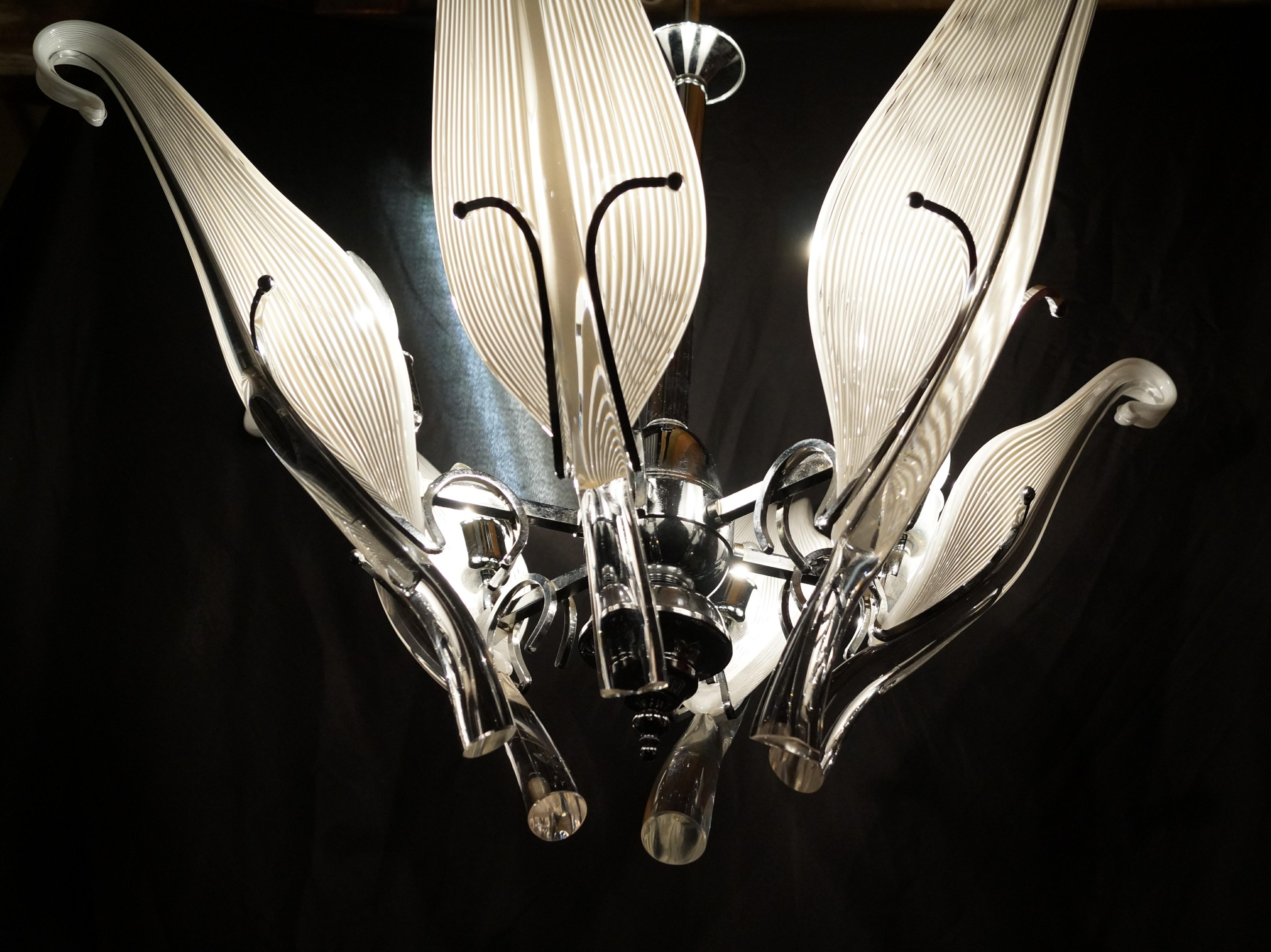 Mid-Century Modern Franco Luce Murano Glass Chrome Six Arm Leaf Lily Chandelier . The leaves vary in length and width. Approx 4 different length, which is consistent with hand blown glass.  It is approx 22